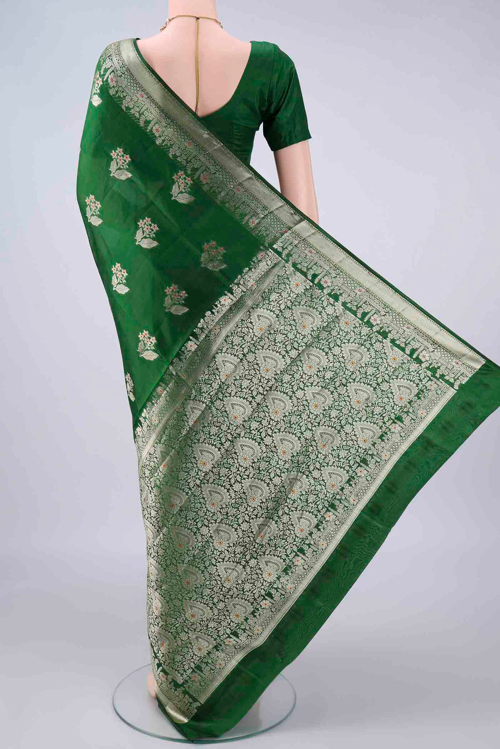 Flat view of Pure Silk Green Banarasi Tussar Saree with Zari And Thread Butta on the body and Zari Border. 