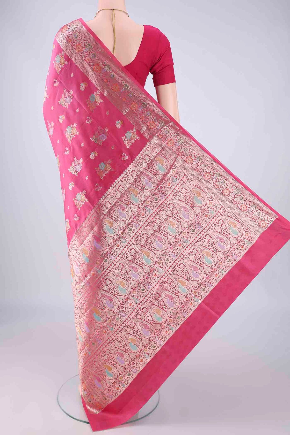 Flat view of Pink Banarasi Raw Silk Saree with Zari And Thread Butta on the body and Zari Border. 