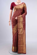 Pure Silk Maroon Kanjivaram Saree with Zari Brocade on the body and Zari Border.  displayed on a mannequin