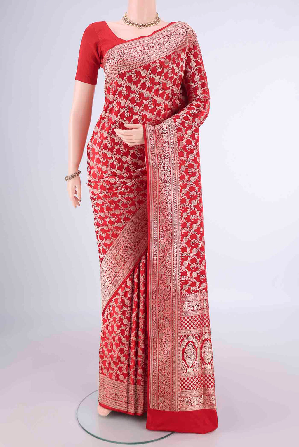 Red Banarasi Silk Saree with Zari Brocade on the body and Zari Border.  displayed on a mannequin