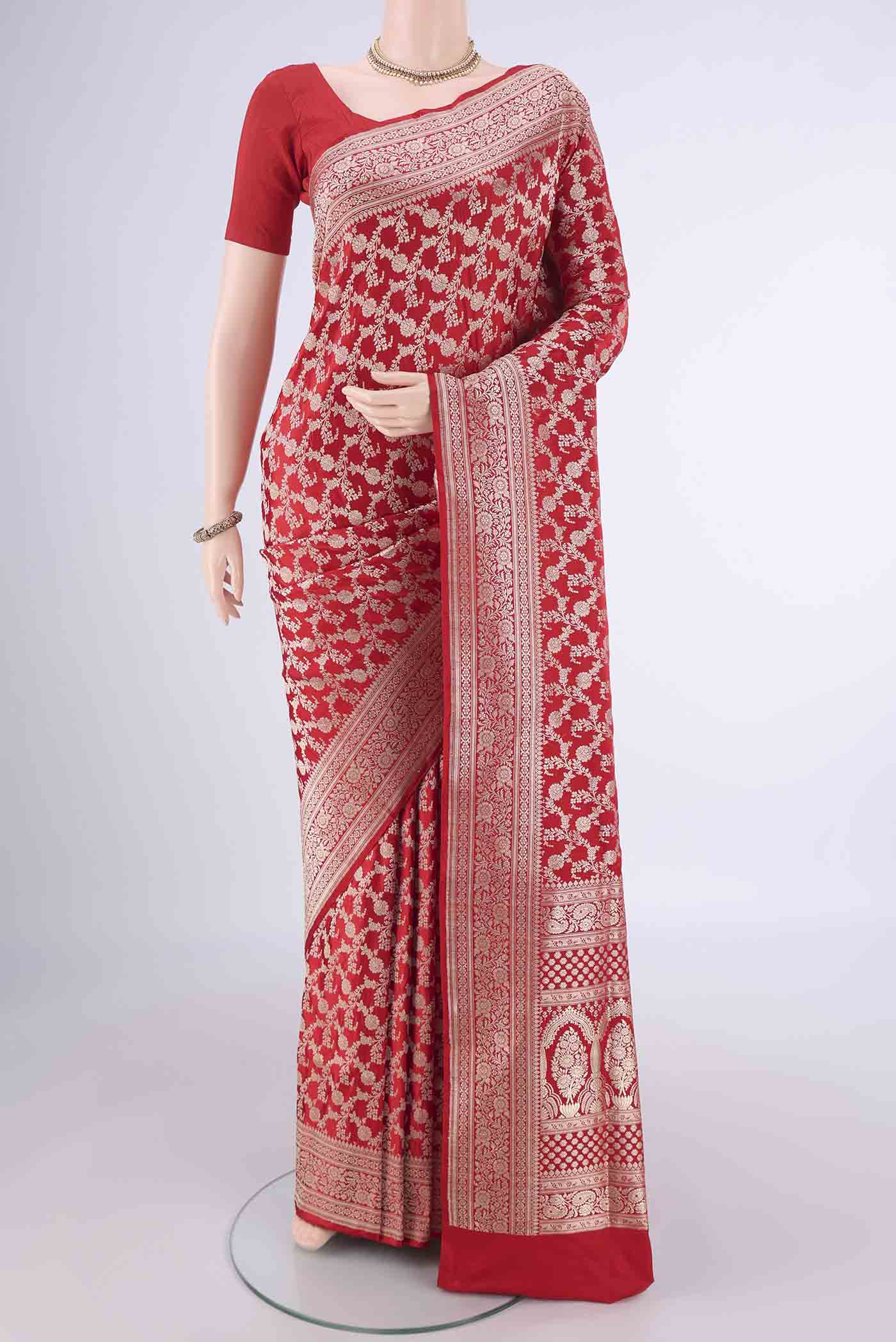 Red Banarasi Silk Saree with Zari Brocade on the body and Zari Border.  displayed on a mannequin