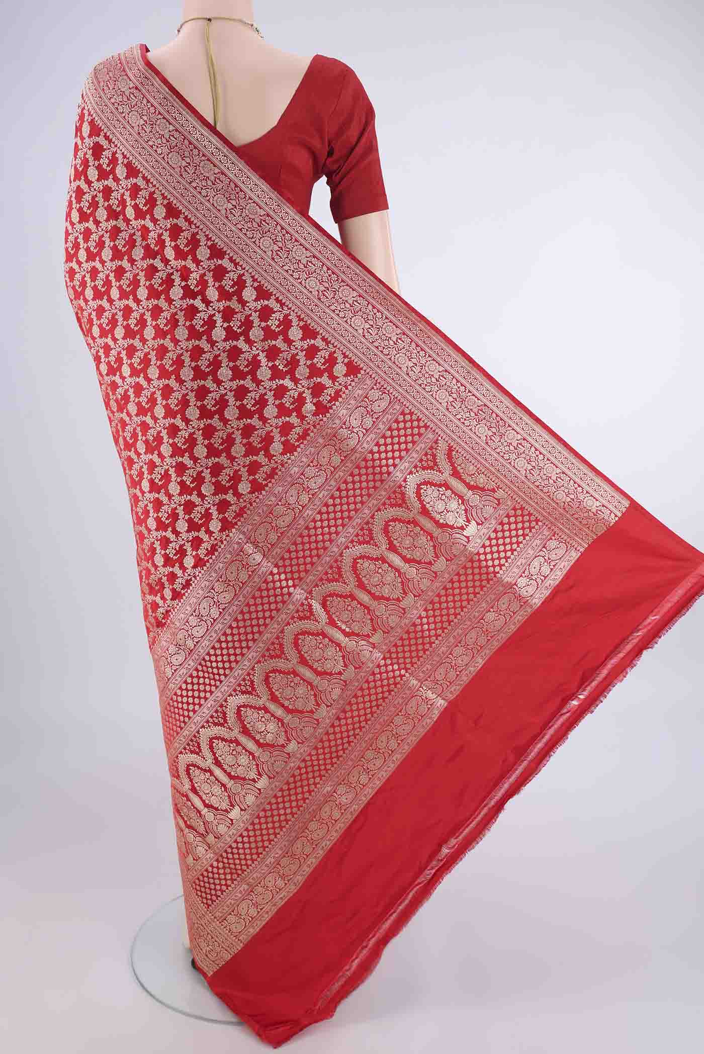 Flat view of Red Banarasi Silk Saree with Zari Brocade on the body and Zari Border. 