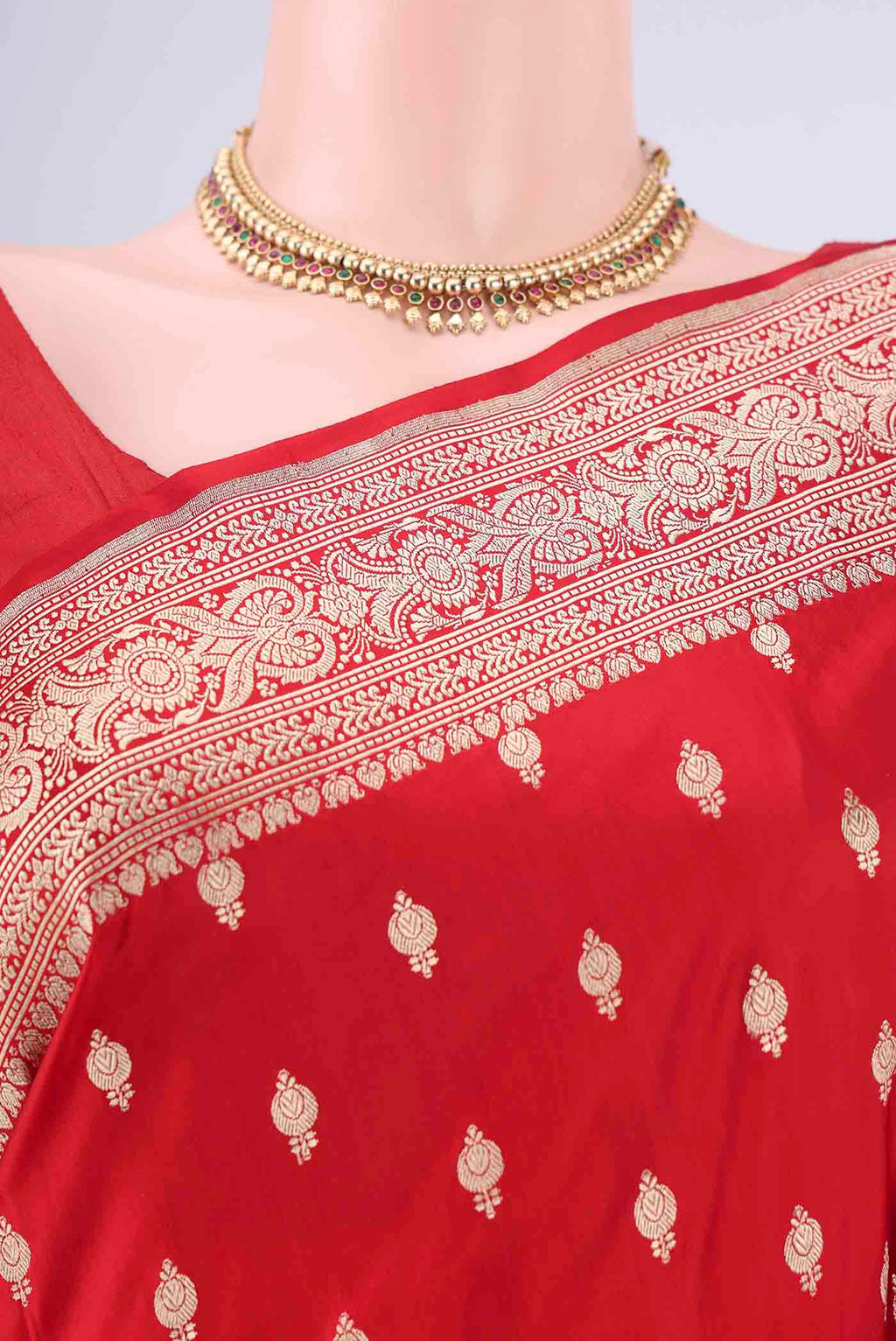 Border image of Red Banarasi Silk Saree with Zari Butta on the body and Zari Border. 