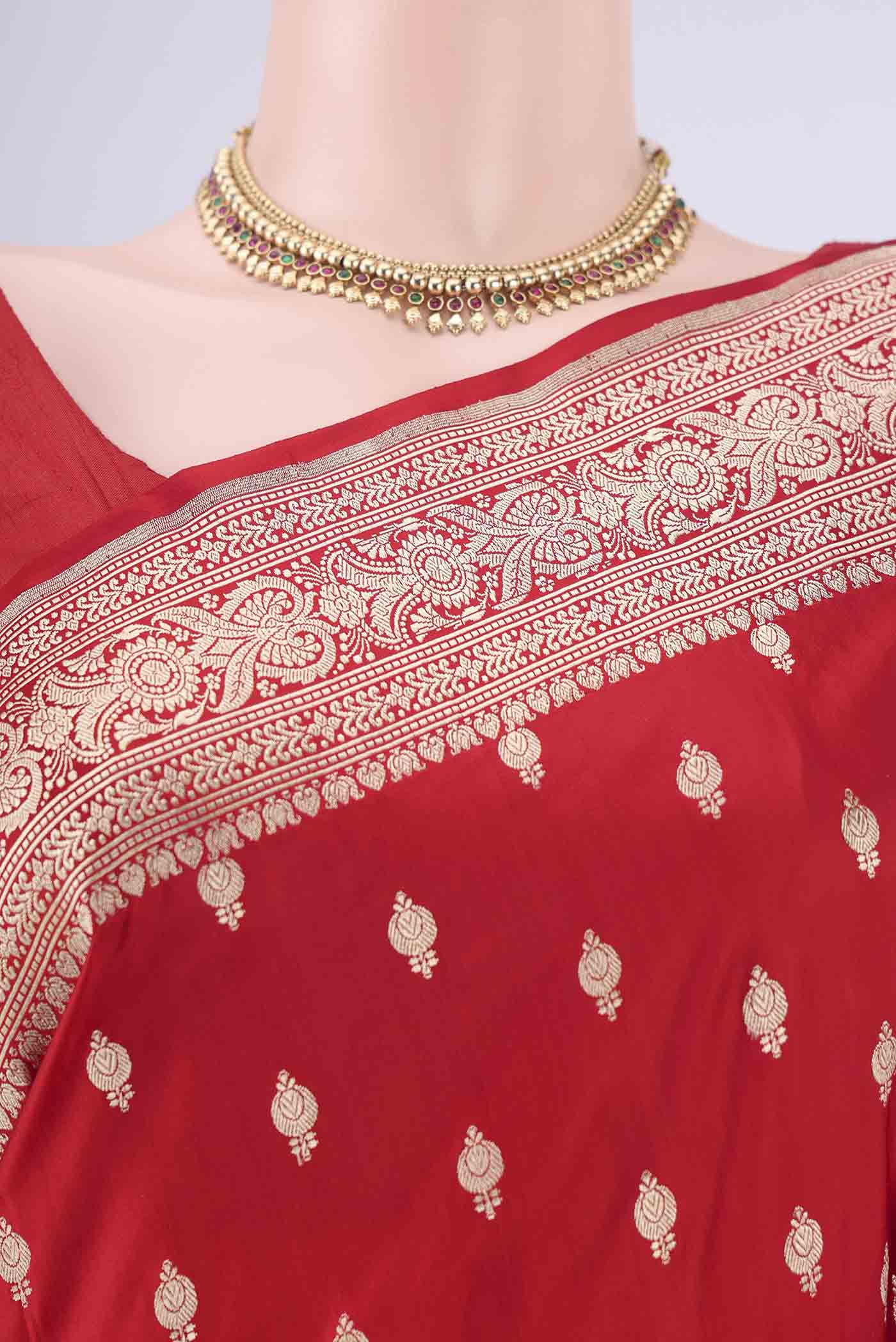 Border image of Red Banarasi Silk Saree with Zari Butta on the body and Zari Border. 