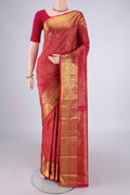 Dark Pink Kanchipuram Silk Saree with Zari Brocade on the body and Zari Border.  displayed on a mannequin