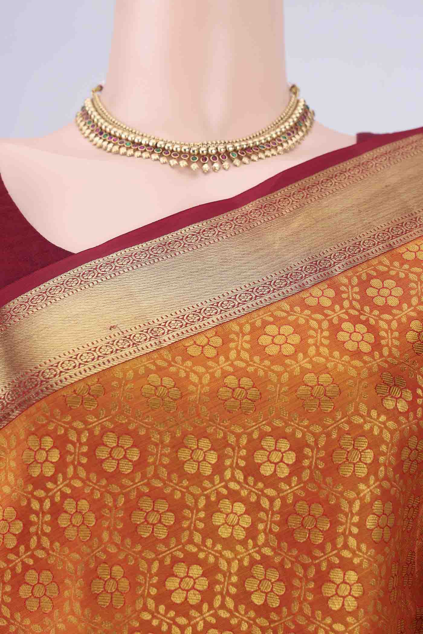 Border image of Brick Orange Kanjivaram Silk Saree with Zari Brocade on the body and Zari Border. 