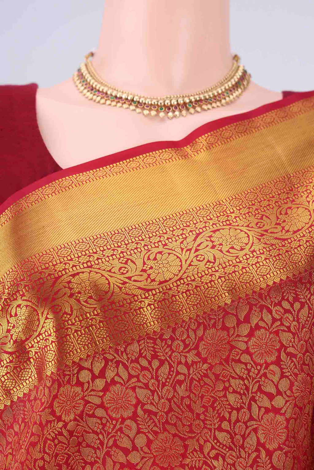 Border image of Red Kanjivaram Silk Saree with Zari Brocade on the body and Zari Border. 