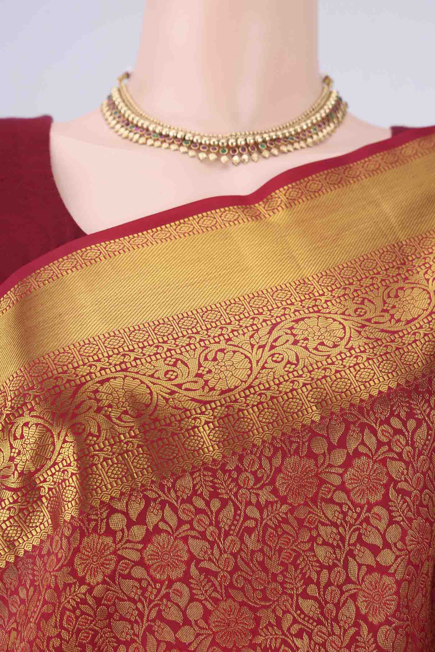 Border image of Red Kanjivaram Silk Saree with Zari Brocade on the body and Zari Border. 