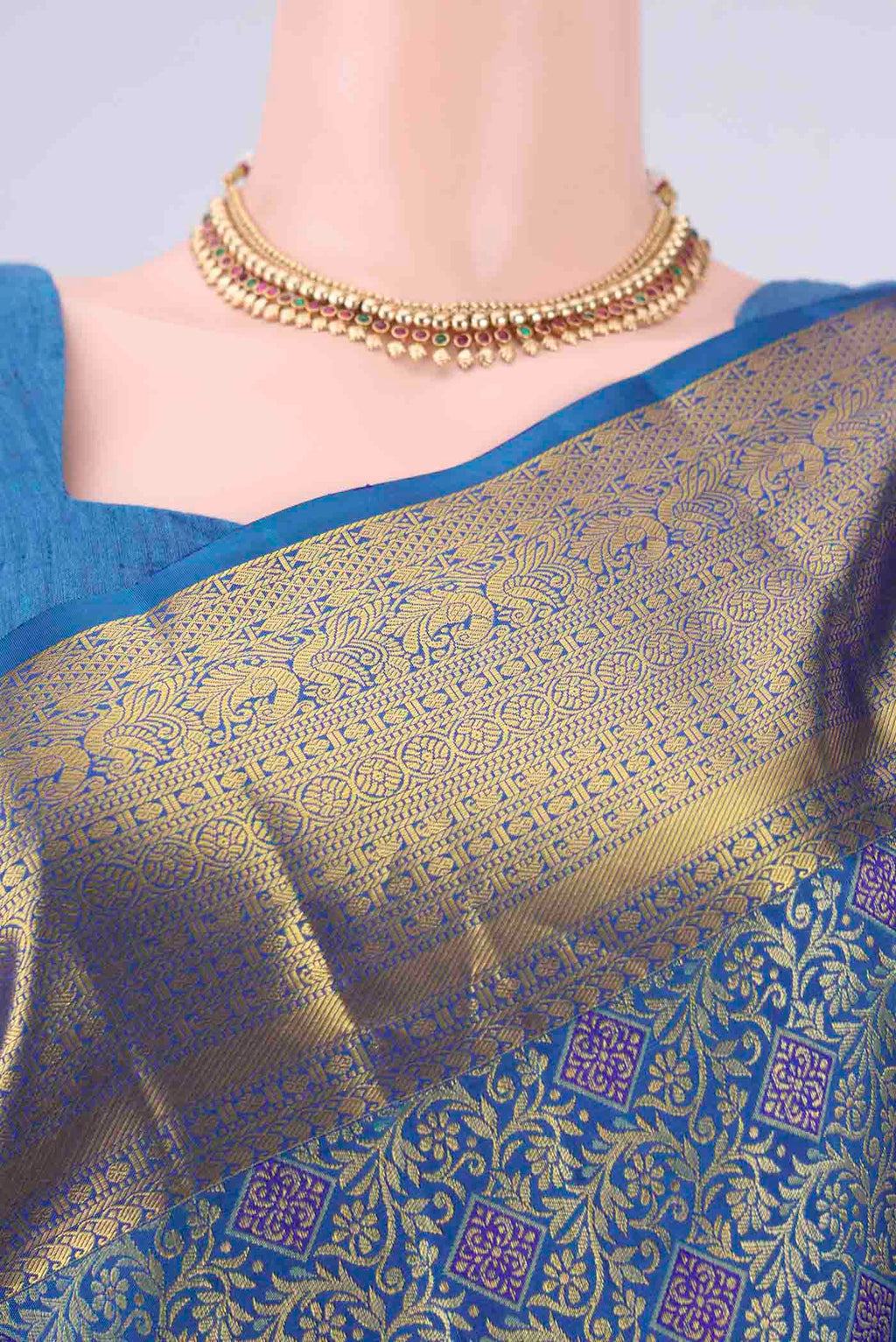 Border image of Blue Kanjivaram Silk Saree with Zari Brocade on the body and Zari Border. 