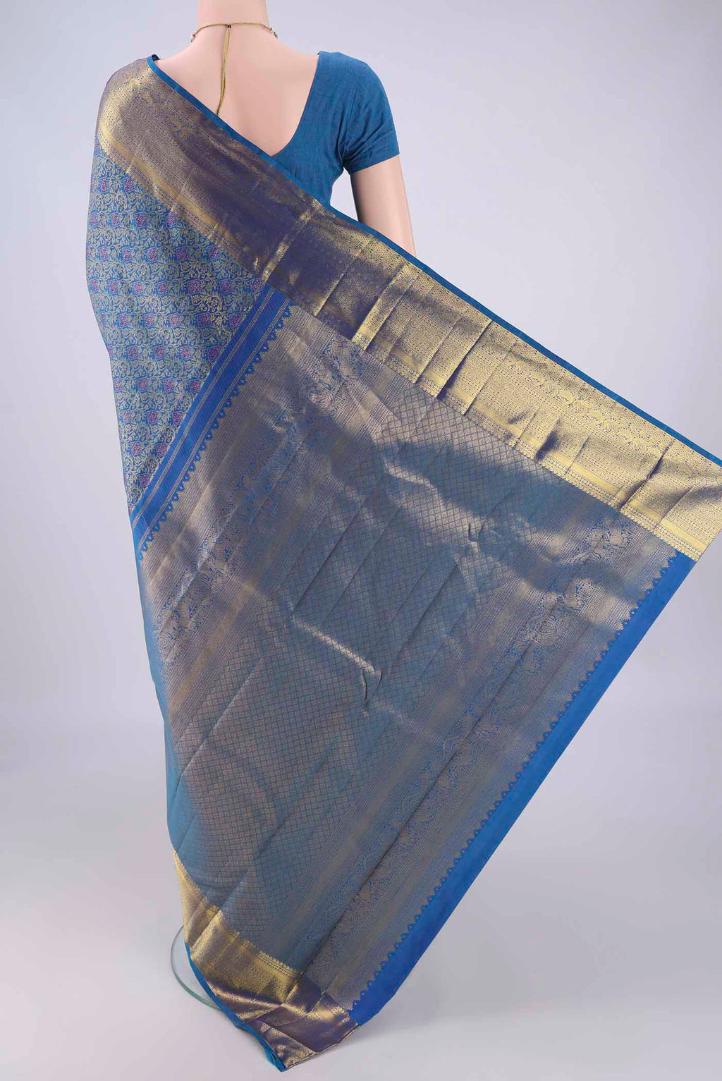 Flat view of Blue Kanjivaram Silk Saree with Zari Brocade on the body and Zari Border. 