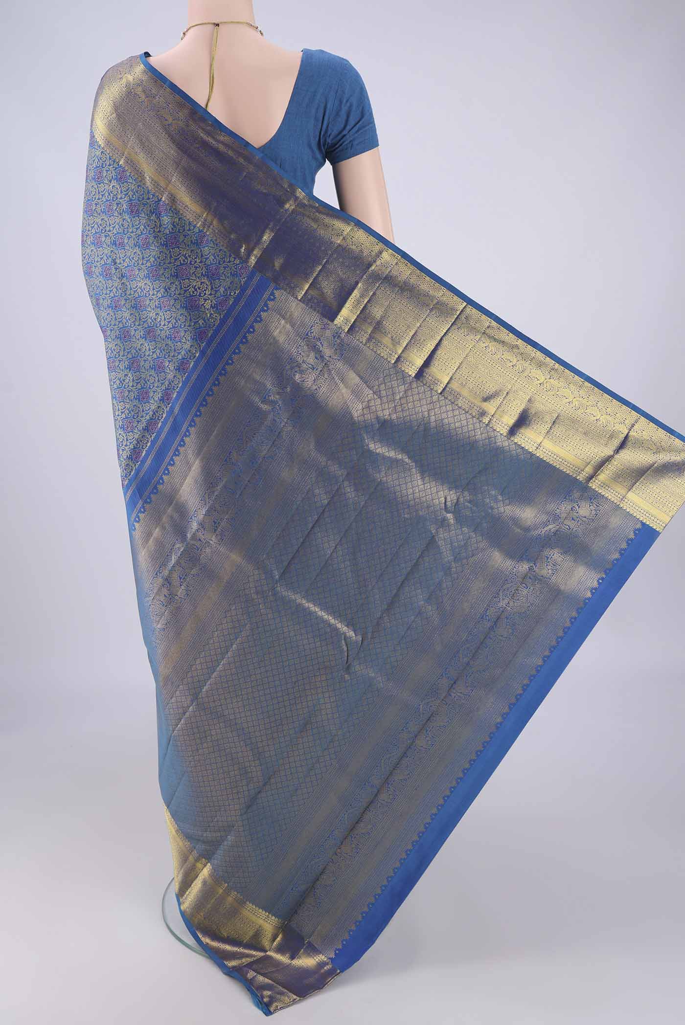 Flat view of Blue Kanjivaram Silk Saree with Zari Brocade on the body and Zari Border. 