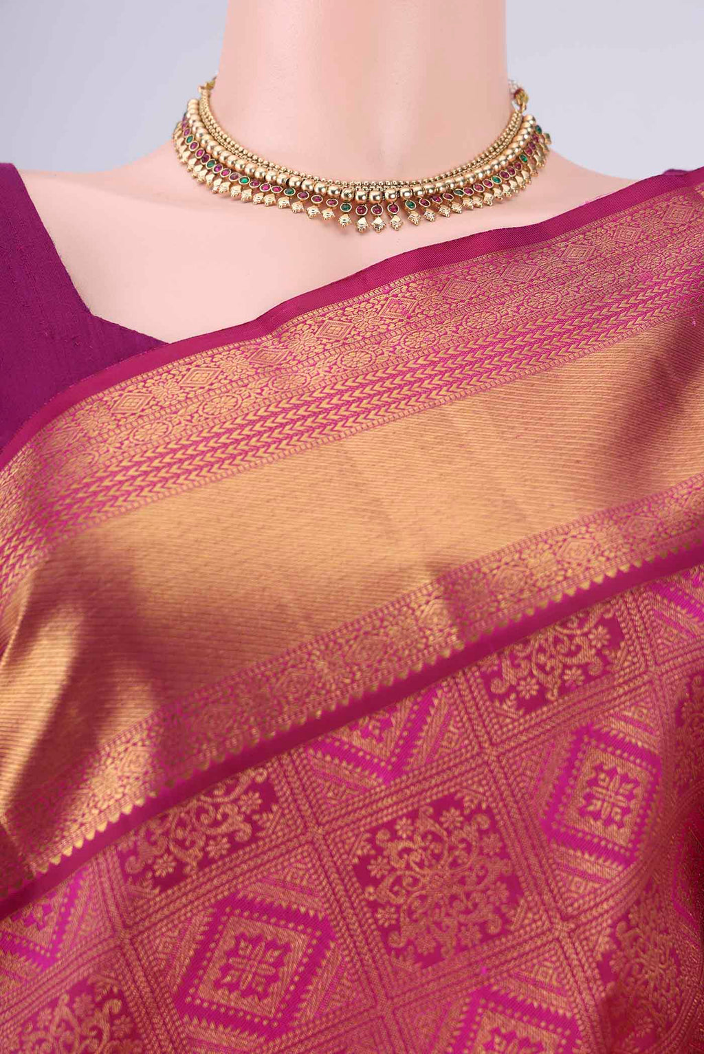 Border image of Magenta Kanjivaram Silk Saree with Zari Brocade on the body and Zari Border. 