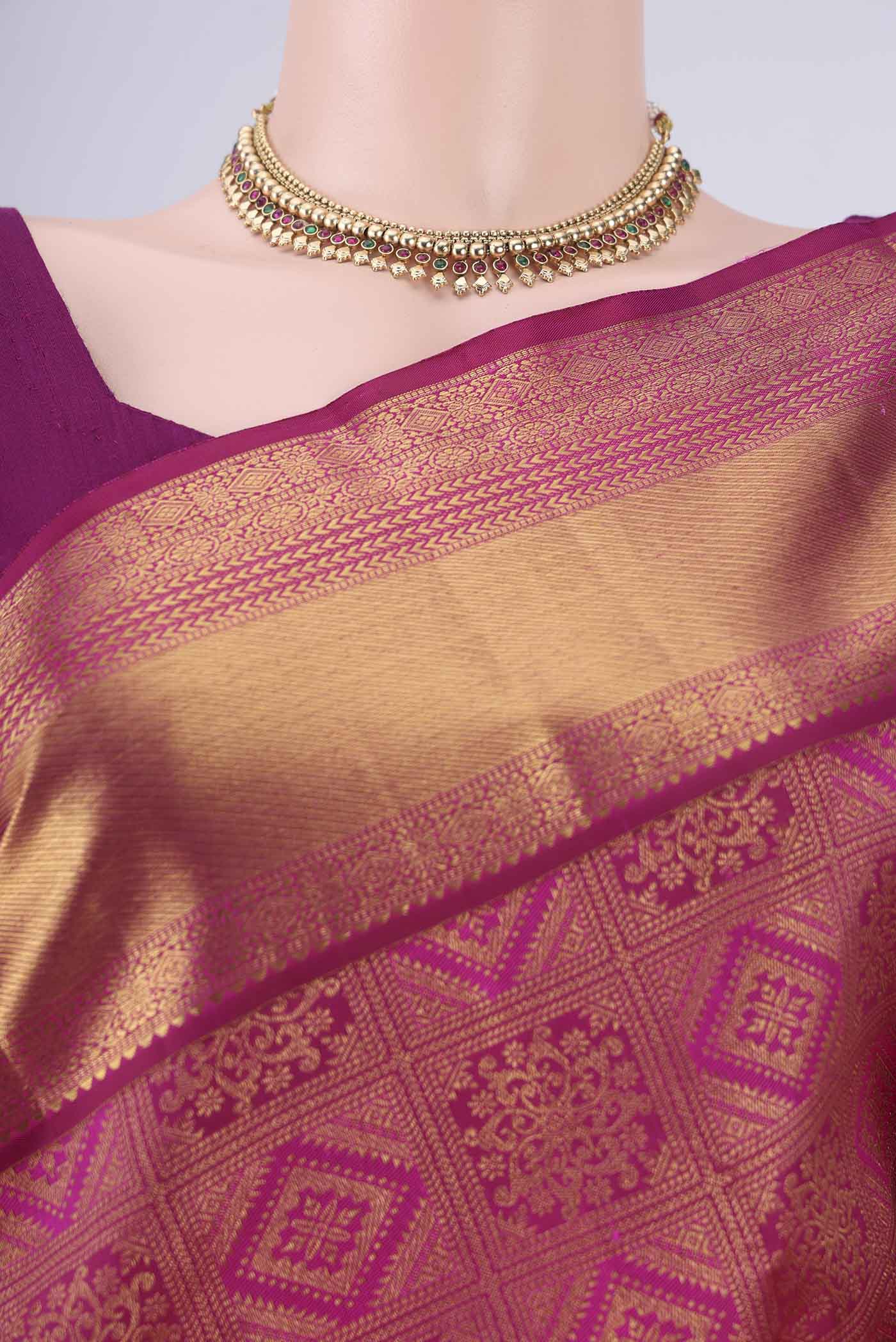 Border image of Magenta Kanjivaram Silk Saree with Zari Brocade on the body and Zari Border. 