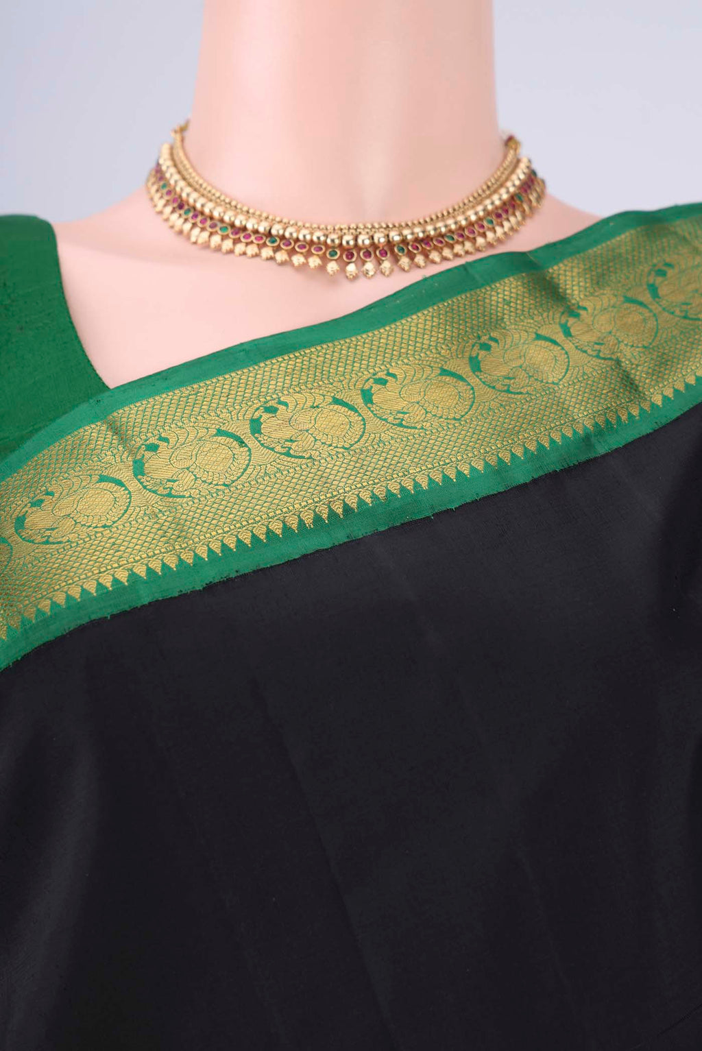 Border image of Black Dual Tone Kanjivaram Silk Saree with Plain Body and Zari Border. 