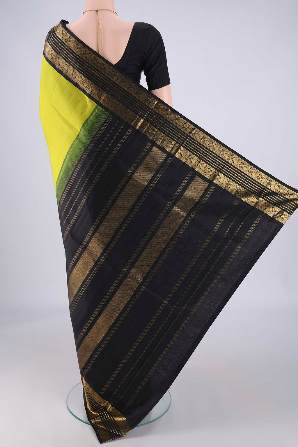 Flat view of Parrot Green Dual Tone Kanjivaram Silk Saree with Plain Body and Zari Border. 