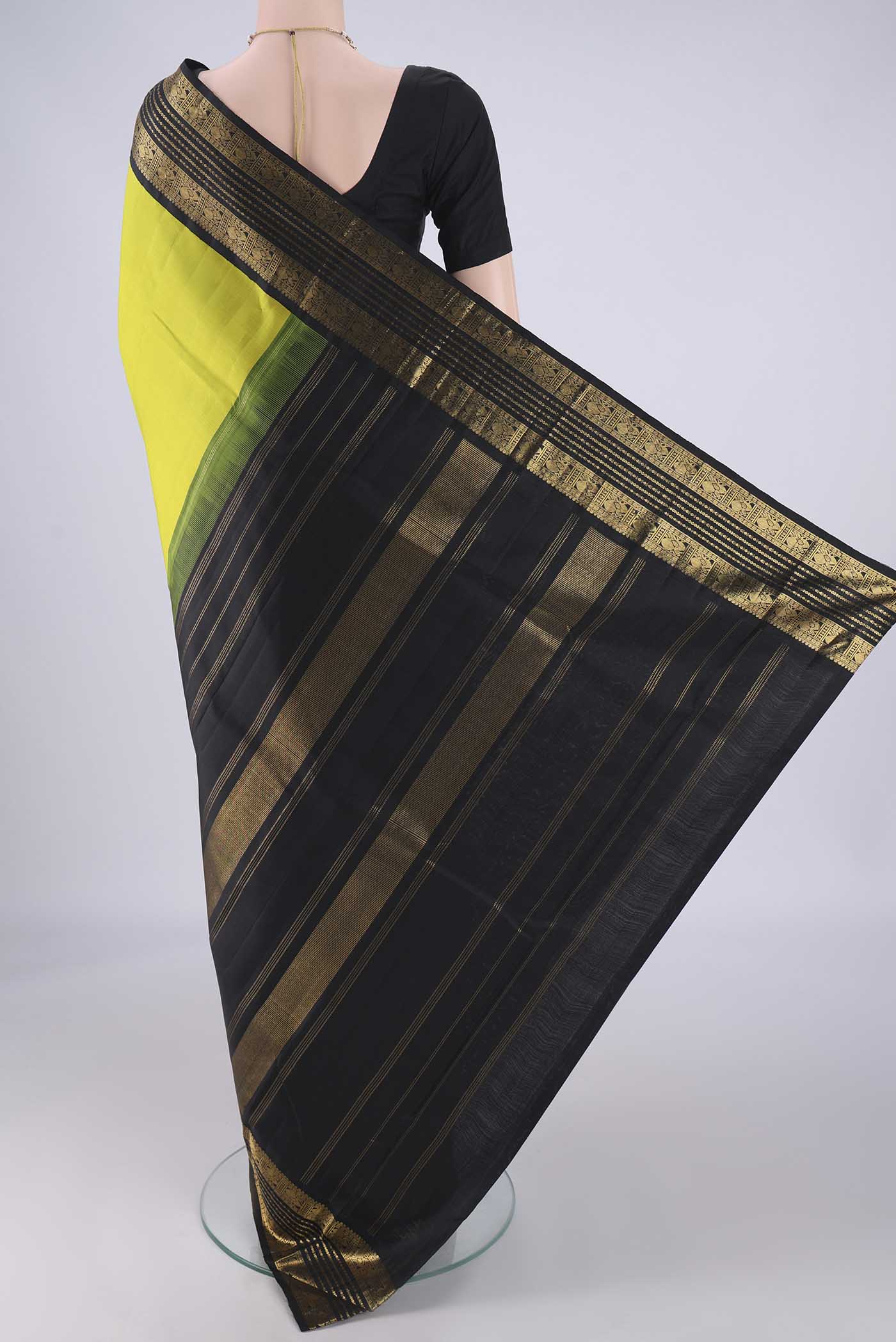Flat view of Parrot Green Dual Tone Kanjivaram Silk Saree with Plain Body and Zari Border. 