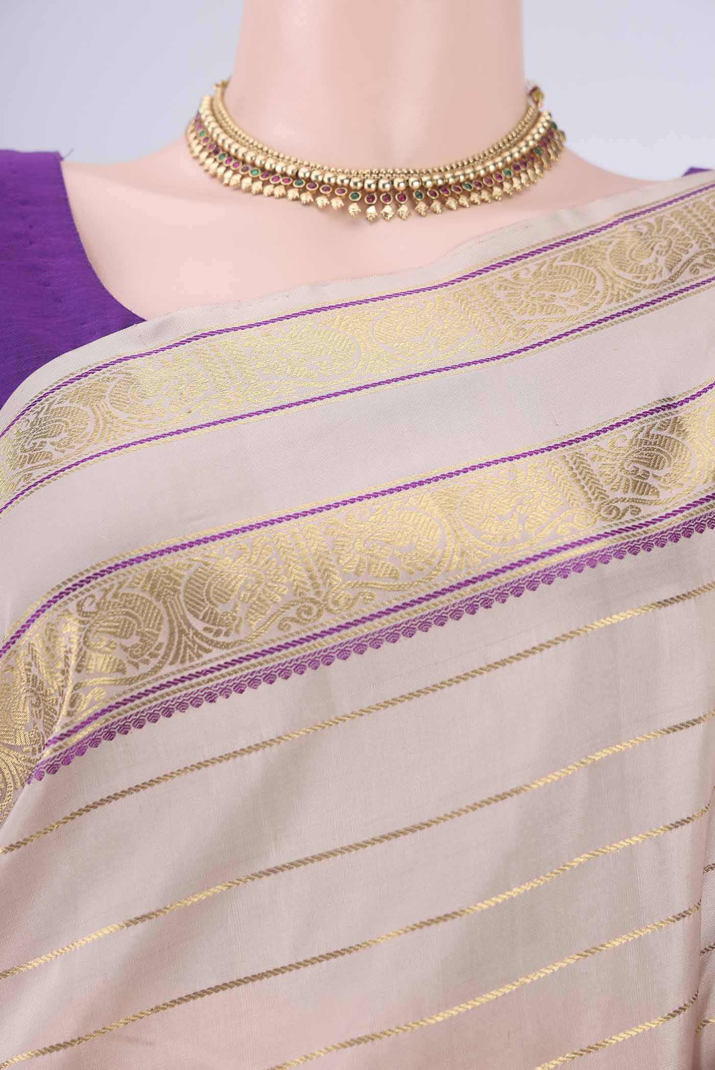 Border image of Beige Dual Tone Kanjivaram Silk Saree with Veldhari on the body and Zari And Thread Border. 