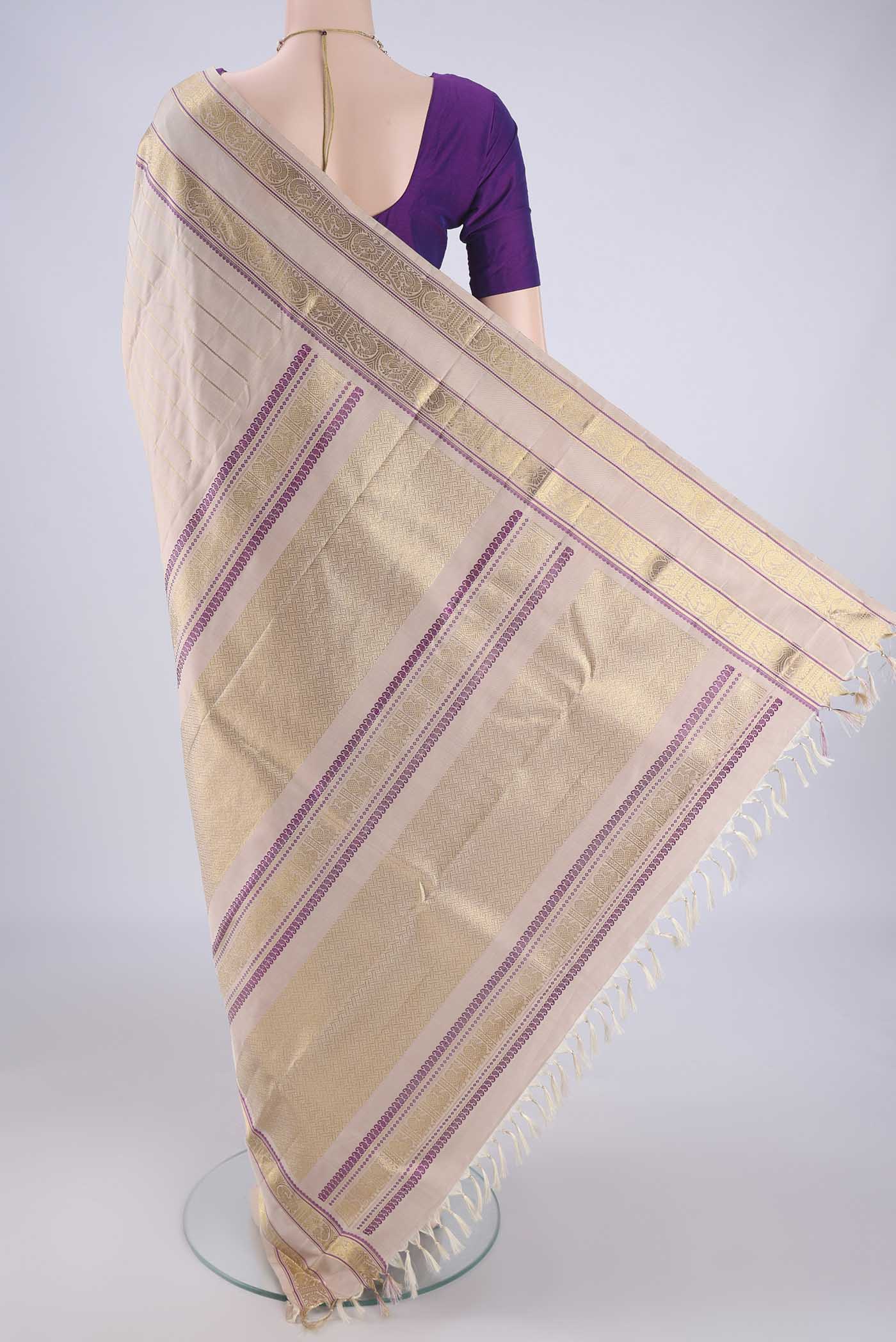 Flat view of Beige Dual Tone Kanjivaram Silk Saree with Veldhari on the body and Zari And Thread Border. 