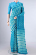 Blue Tussar Saree with Printed design on the body and Without Border.  displayed on a mannequin