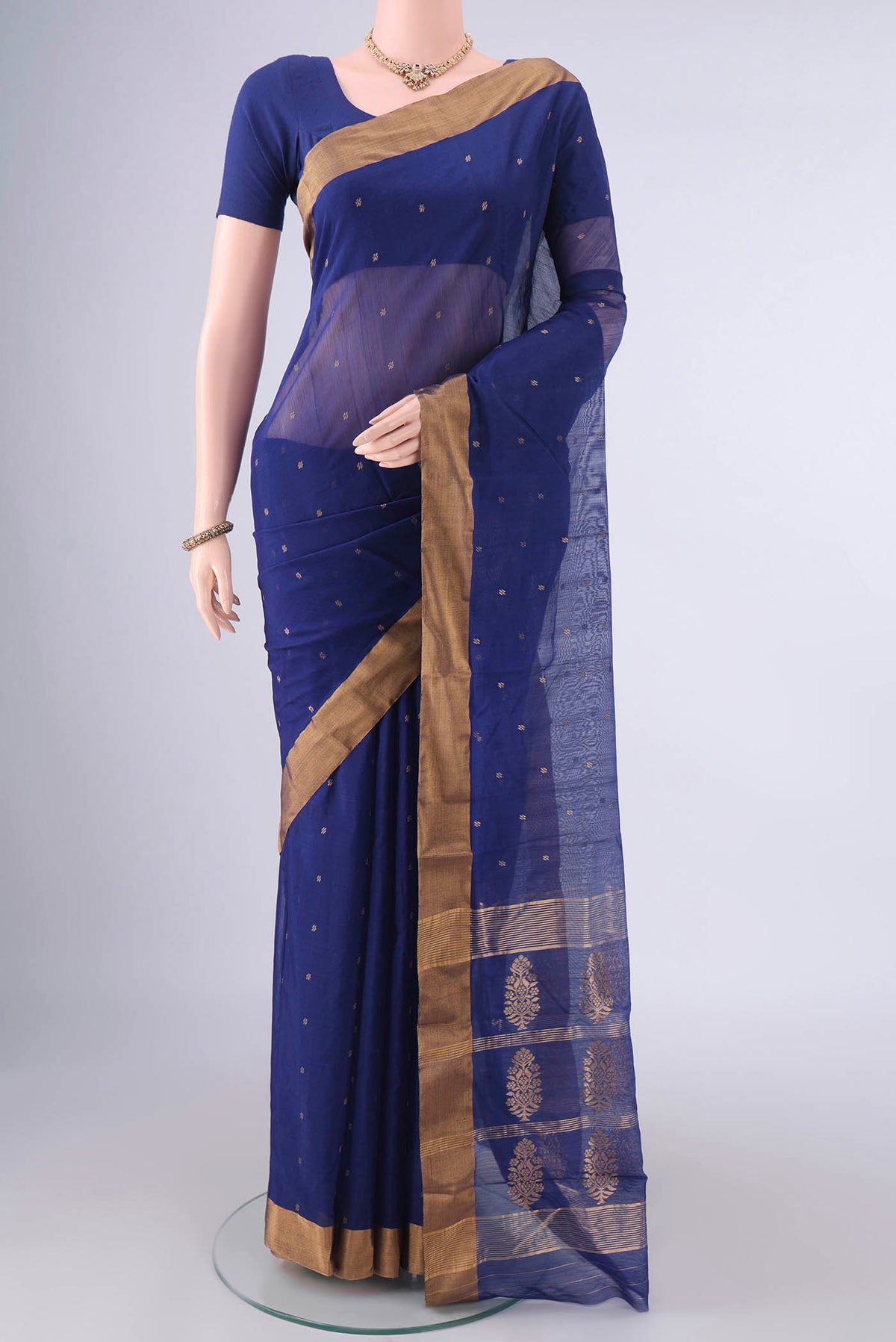Blue Chanderi Cotton Saree with Zari Butta on the body and Zari Border.  displayed on a mannequin