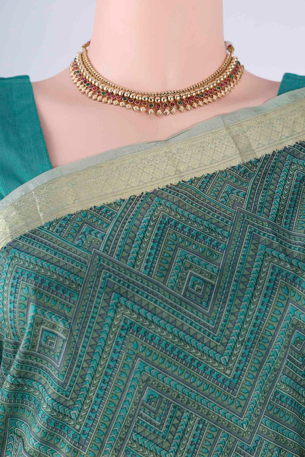 Border image of Sage Green Printed Silk Saree with Printed design on the body and Zari Border. 