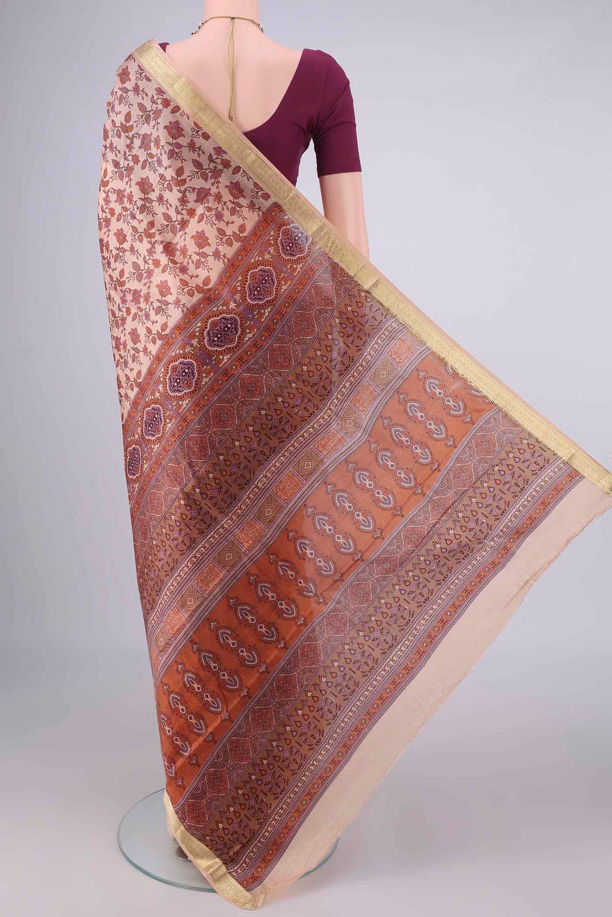 Flat view of Pure Silk Peach Printed Saree with Printed design on the body and Zari Border. 