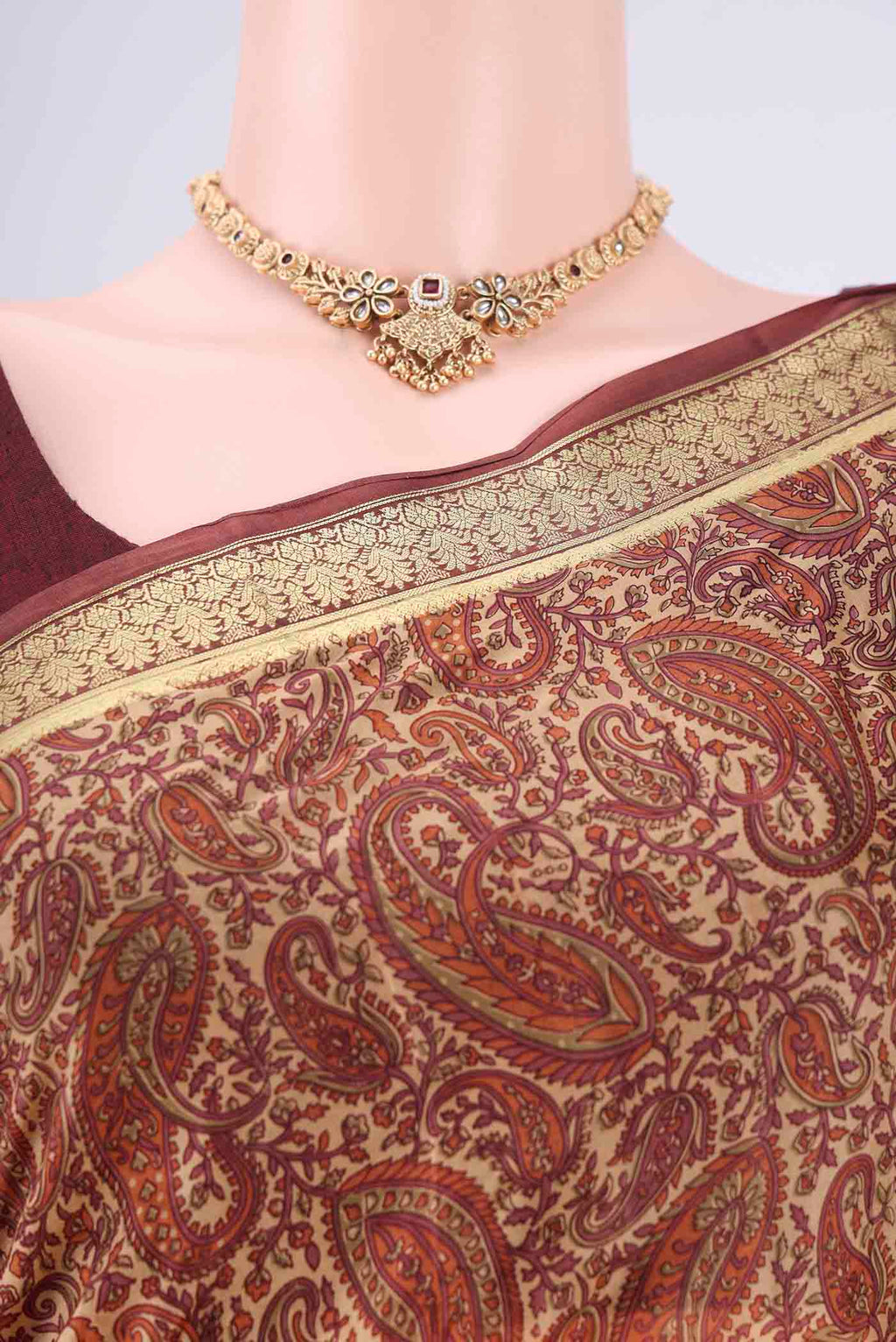 Border image of Sandal Printed Silk Saree with Printed design on the body and Zari Border. 