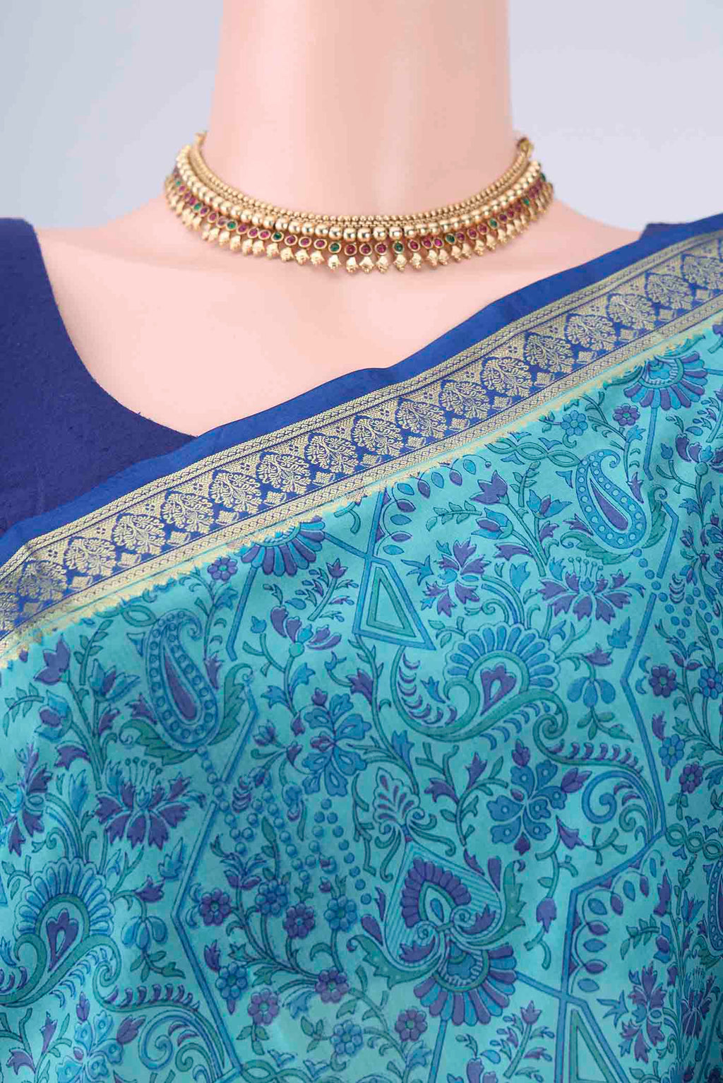 Border image of Blue Printed Silk Saree with Printed design on the body and Zari Border. 