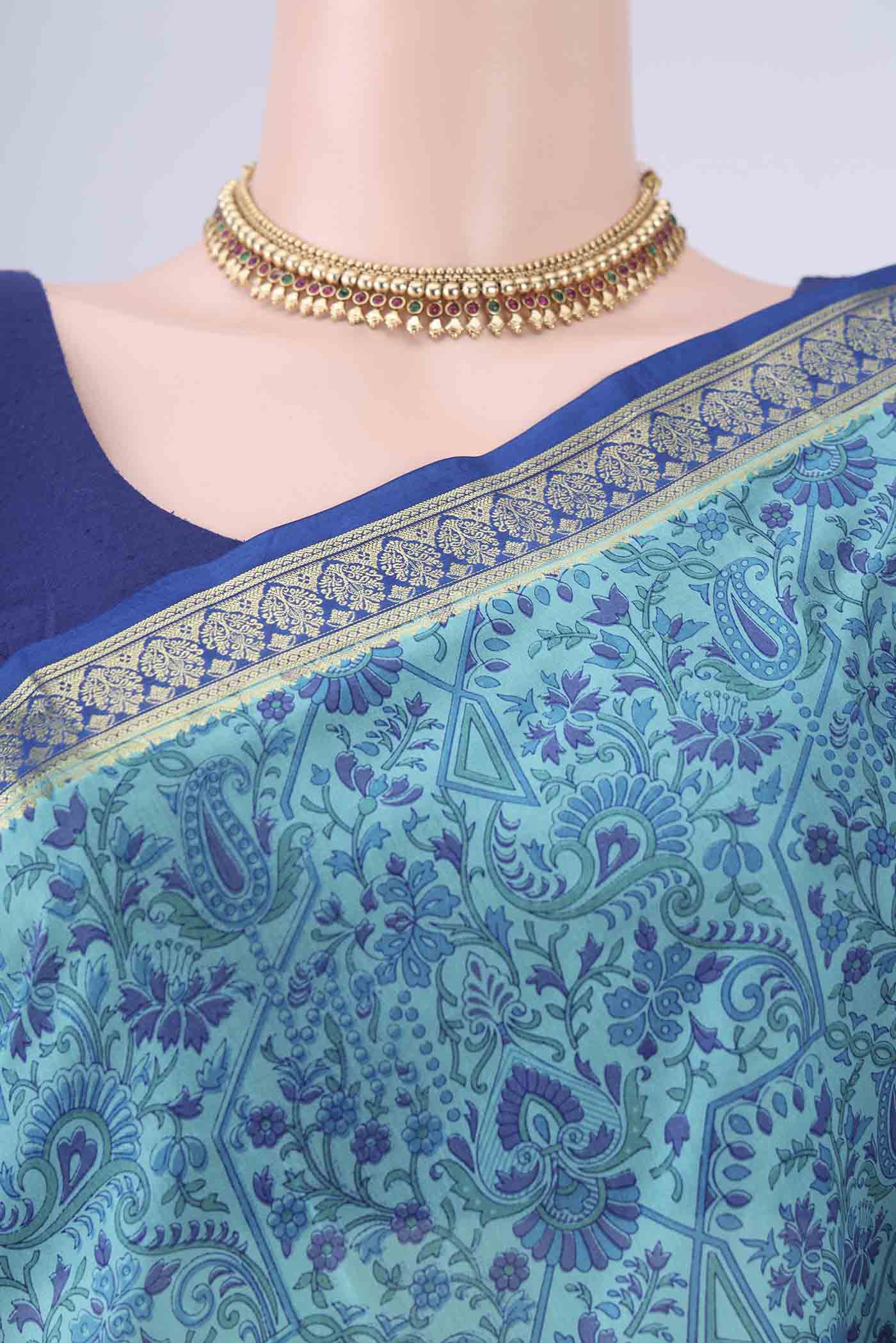 Border image of Blue Printed Silk Saree with Printed design on the body and Zari Border. 