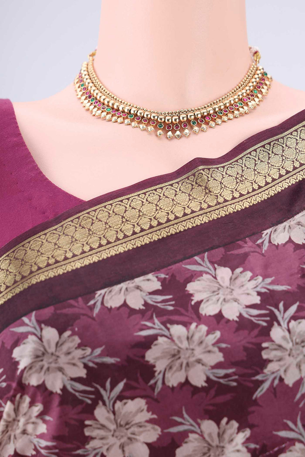 Border image of Burgundy Printed Silk Saree with Printed design on the body and Zari Border. 