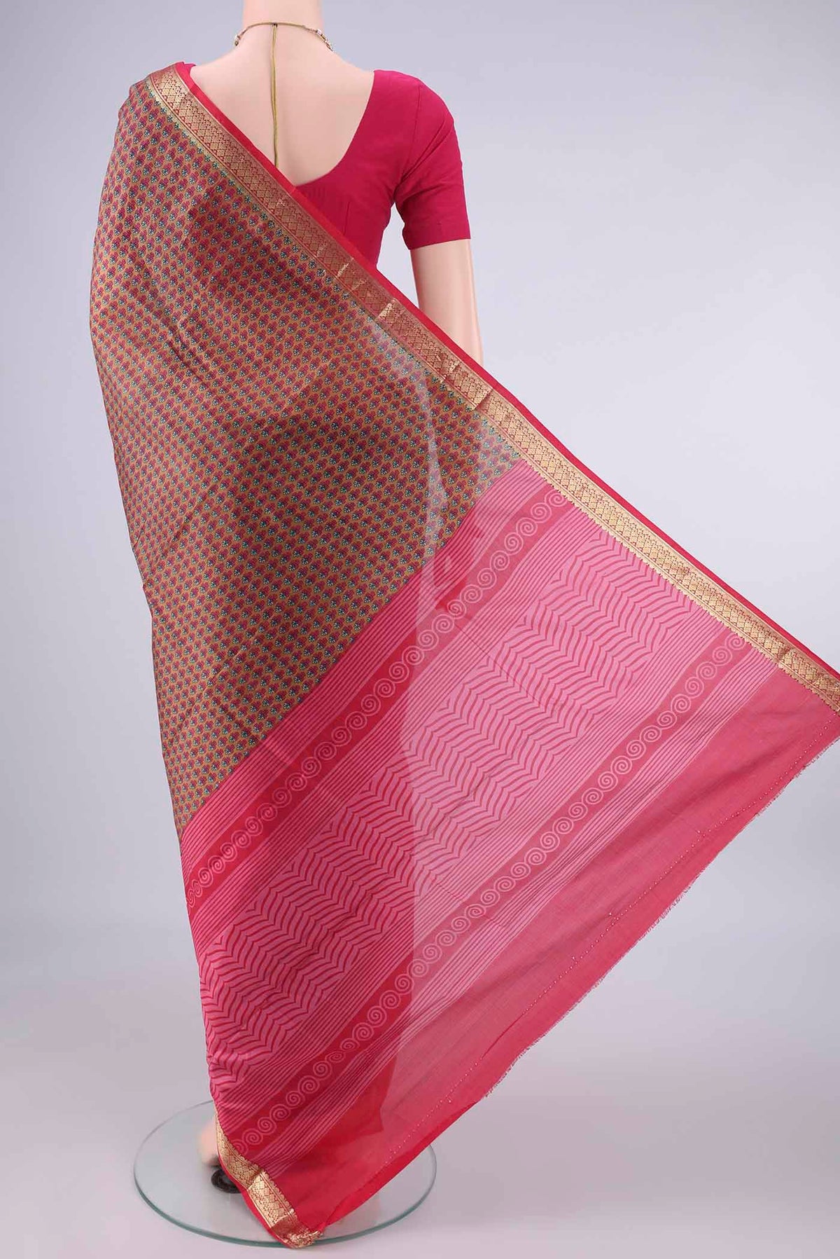 Flat view of Pure Silk Brown Printed Saree with Printed design on the body and Zari Border. 