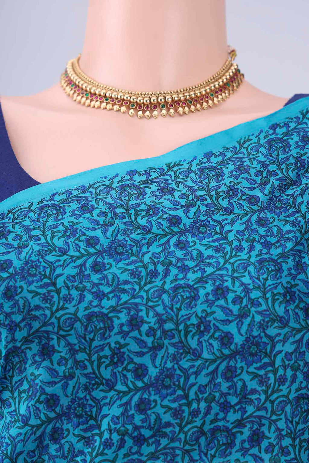 Border image of Blue Printed Silk Saree with Printed design on the body and Plain Border. 