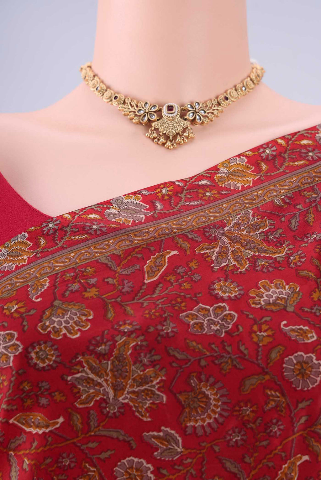 Border image of Maroon Printed Silk Saree with Printed design on the body and Zari Border. 