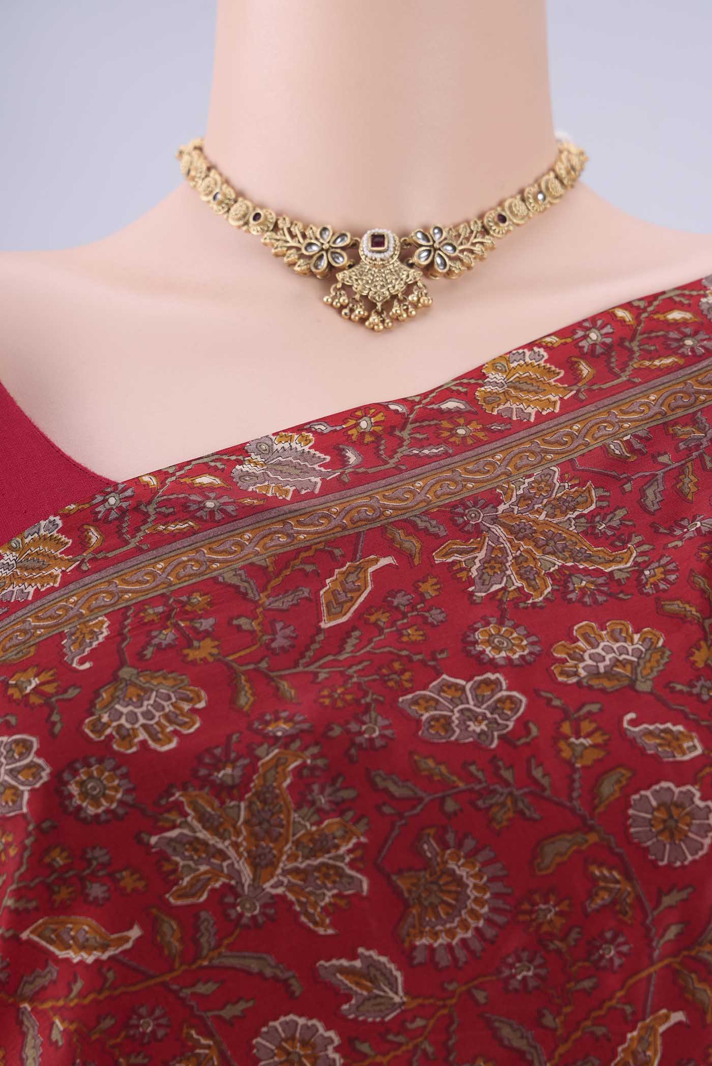 Border image of Maroon Printed Silk Saree with Printed design on the body and Zari Border. 
