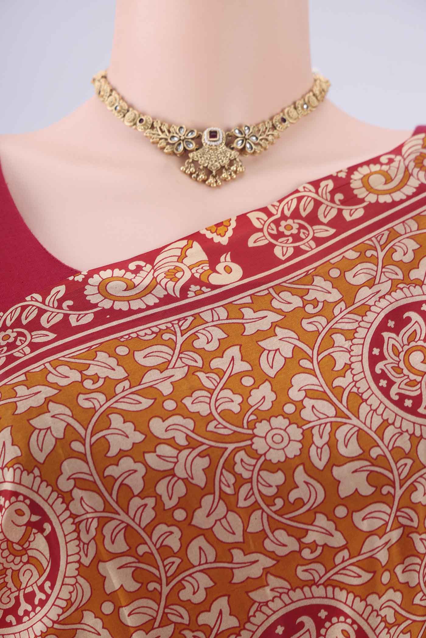 Border image of Rust Printed Silk Saree with Printed design on the body and Zari Border. 