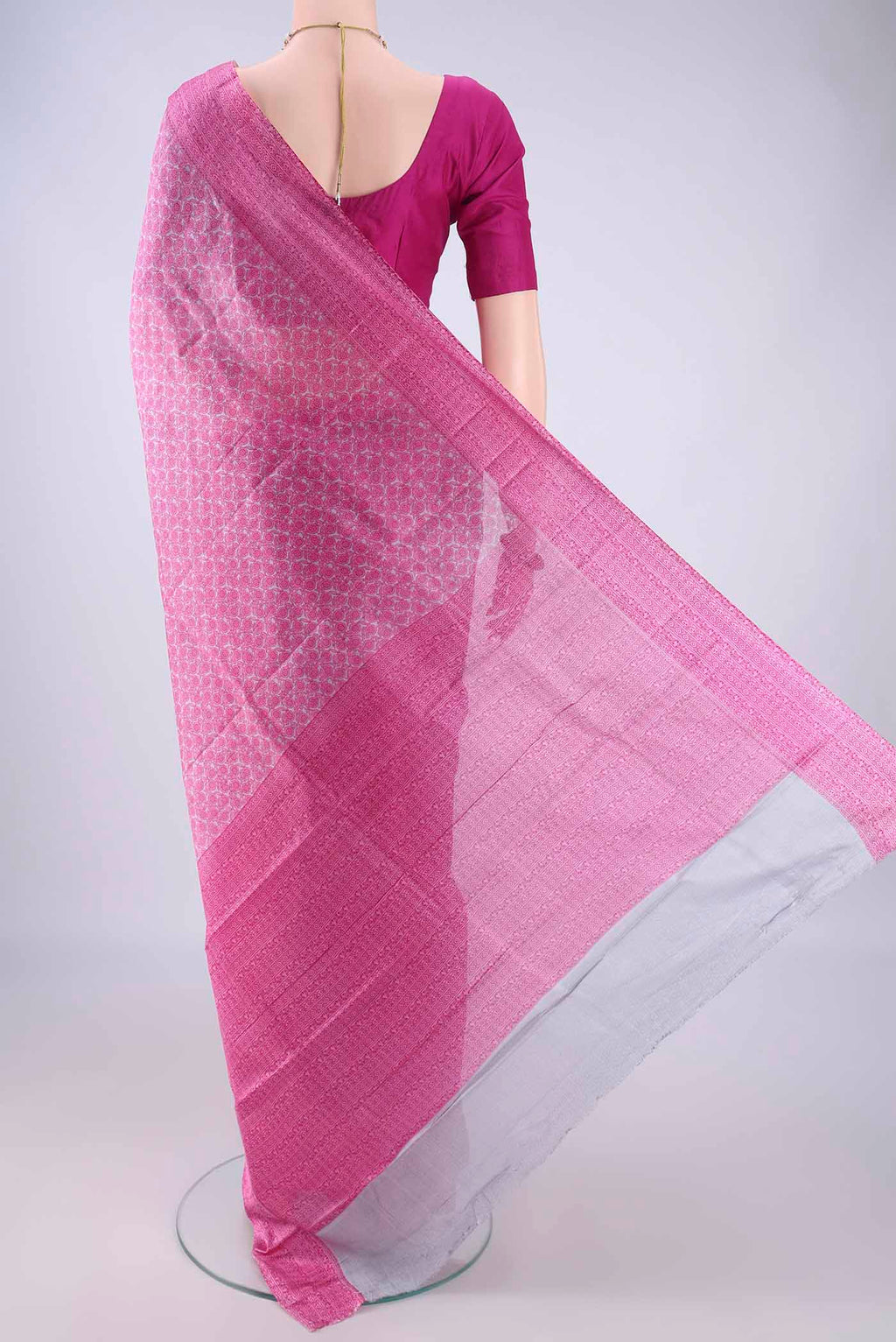 Flat view of Pink Printed Silk Saree with Printed design on the body and Printed Border. 