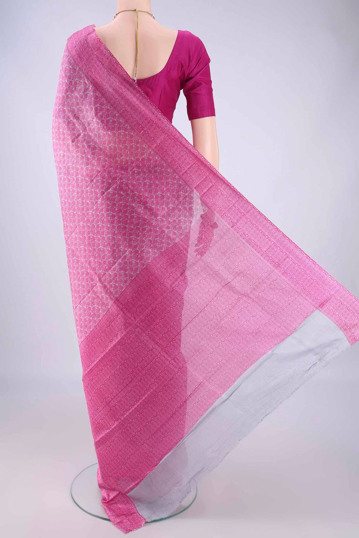 Flat view of Pink Printed Silk Saree with Printed design on the body and Printed Border. 