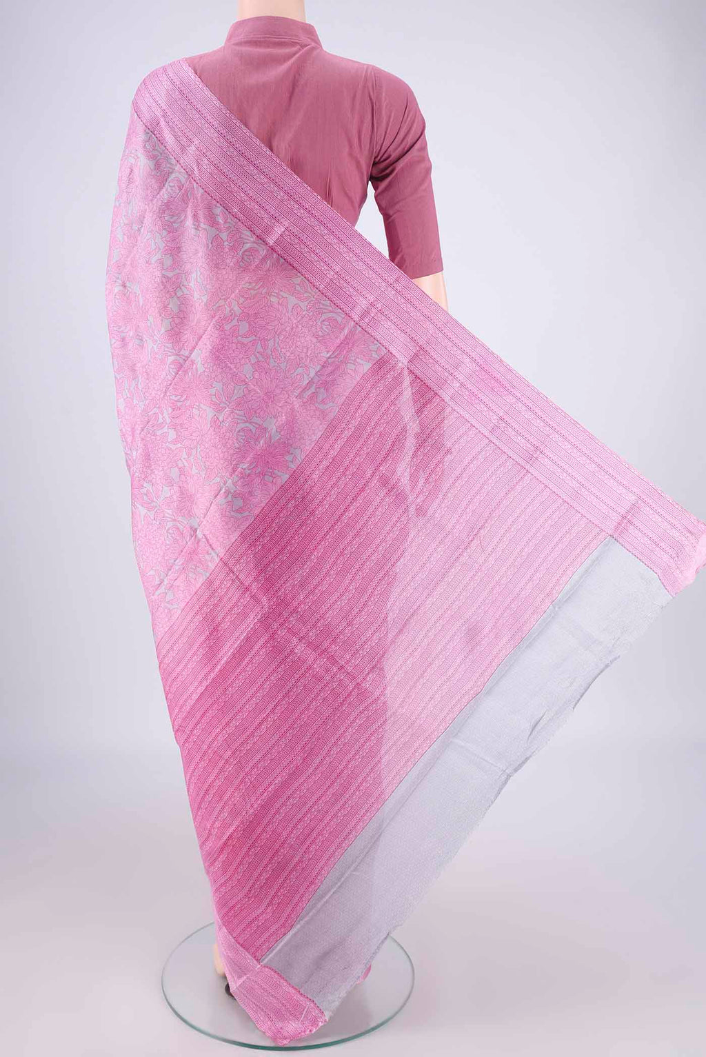 Flat view of Grey Printed Silk Saree with Printed design on the body and Printed Border. 