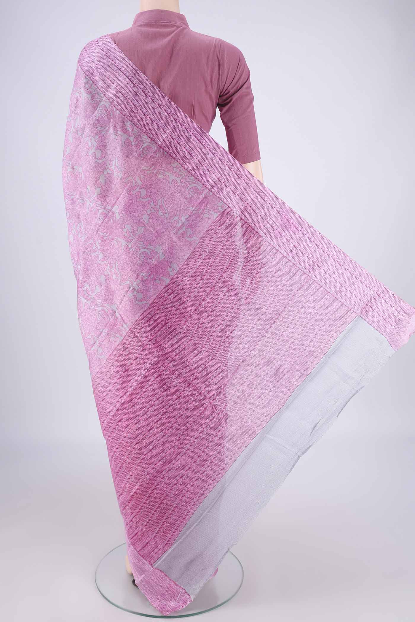 Flat view of Grey Printed Silk Saree with Printed design on the body and Printed Border. 
