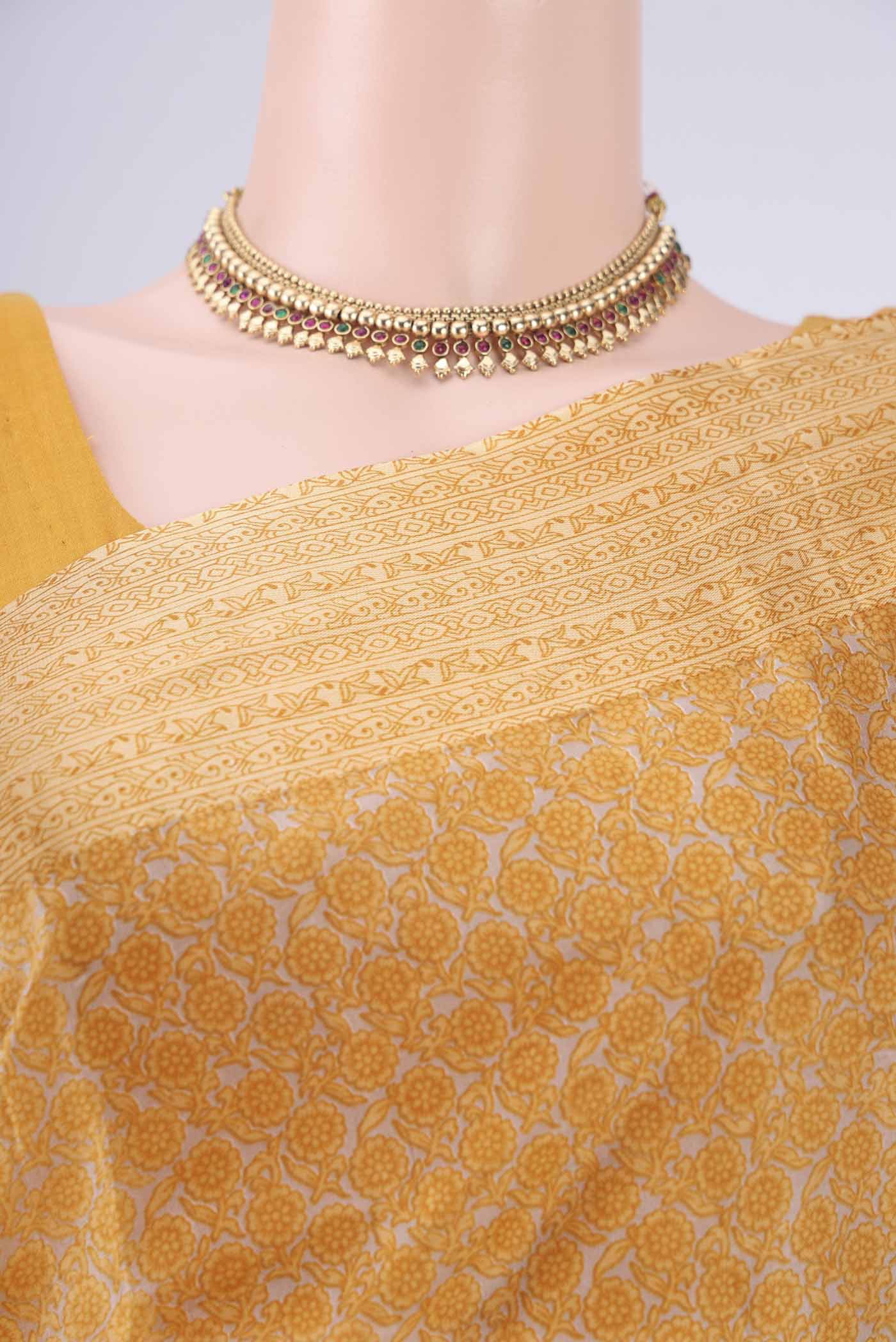 Border image of Beige Printed Silk Saree with Printed design on the body and Zari Border. 