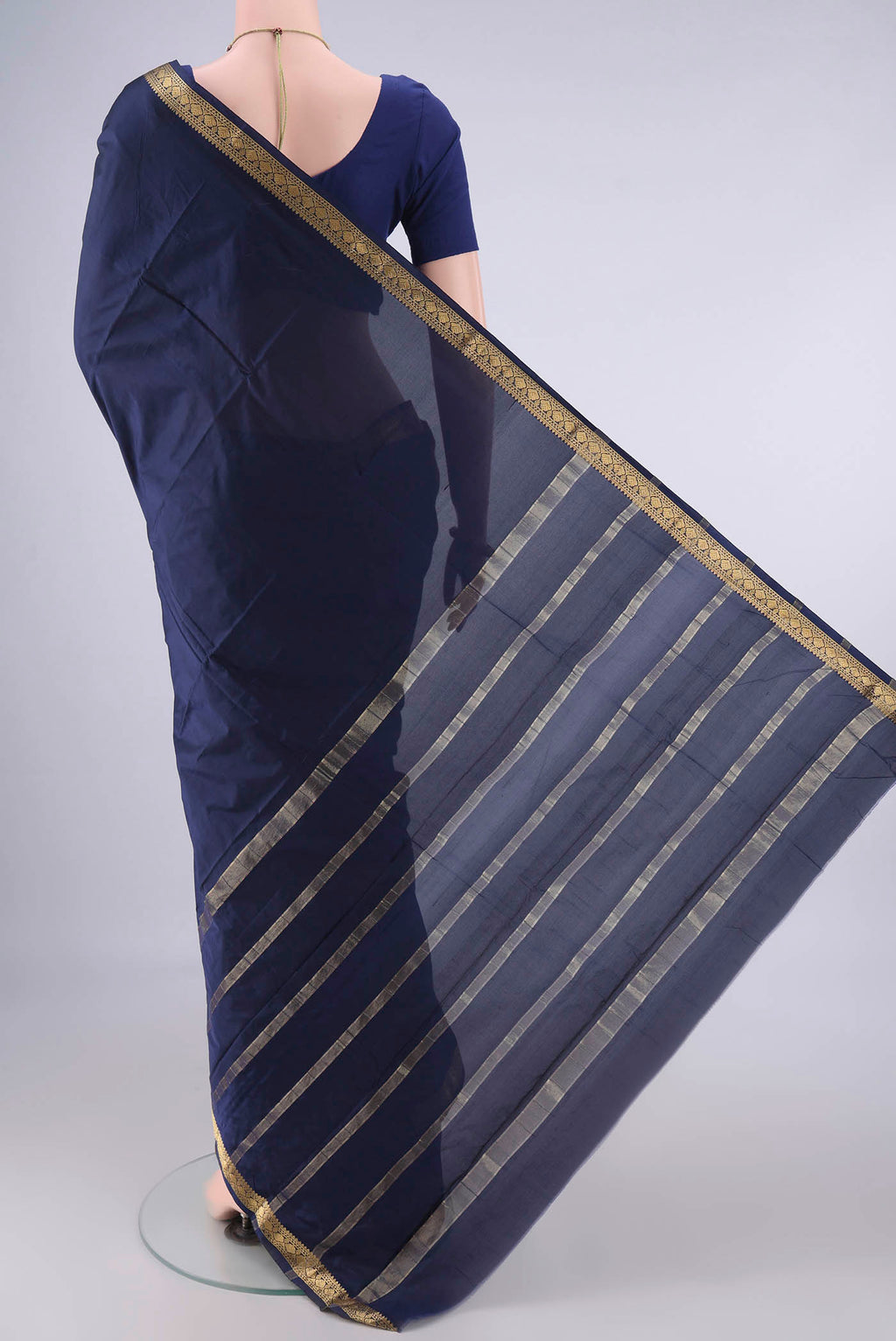 Flat view of Navy Blue Blended Bangalore Silk Saree with Plain Body and Zari Border. 