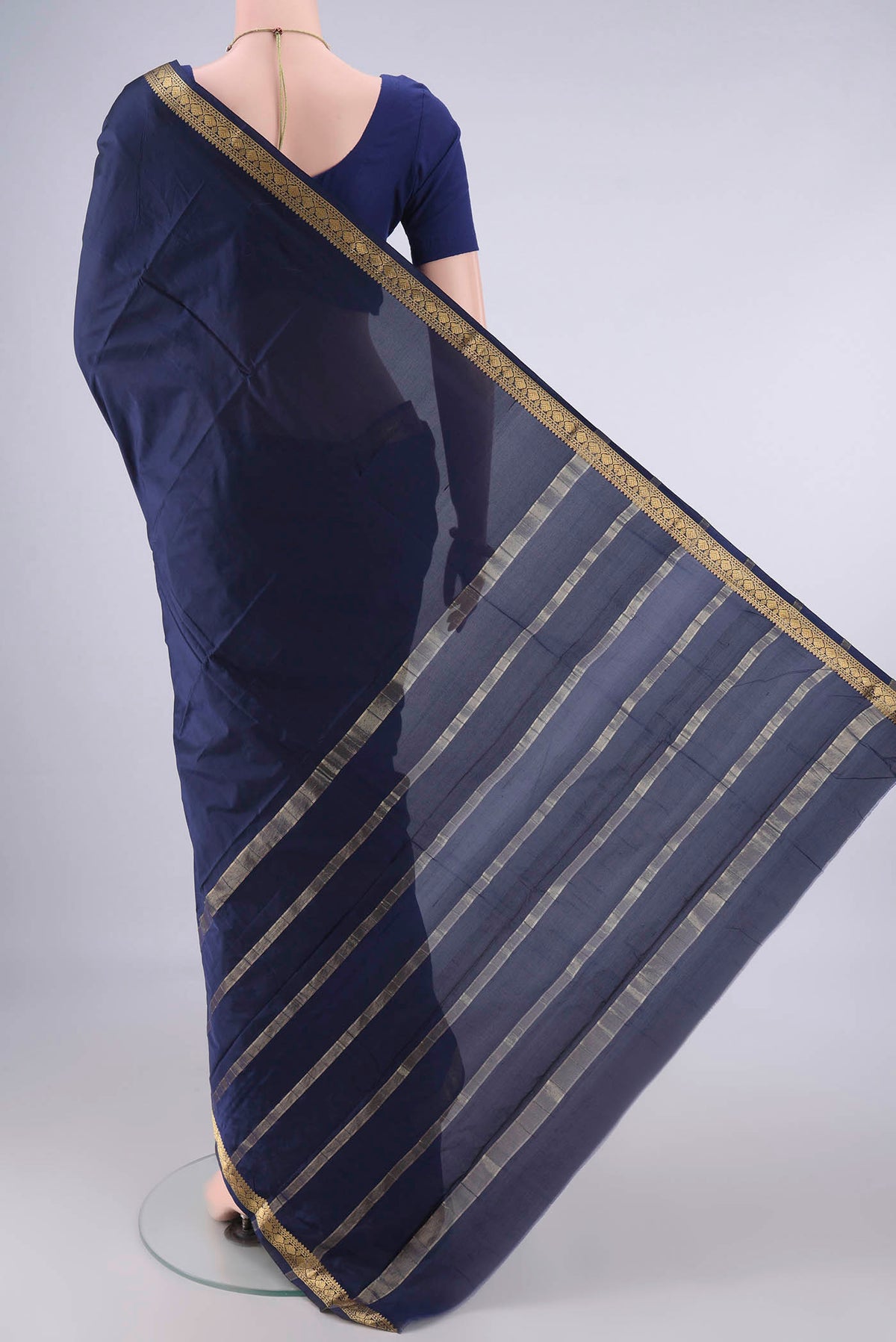 Flat view of Navy Blue Blended Bangalore Silk Saree with Plain Body and Zari Border. 