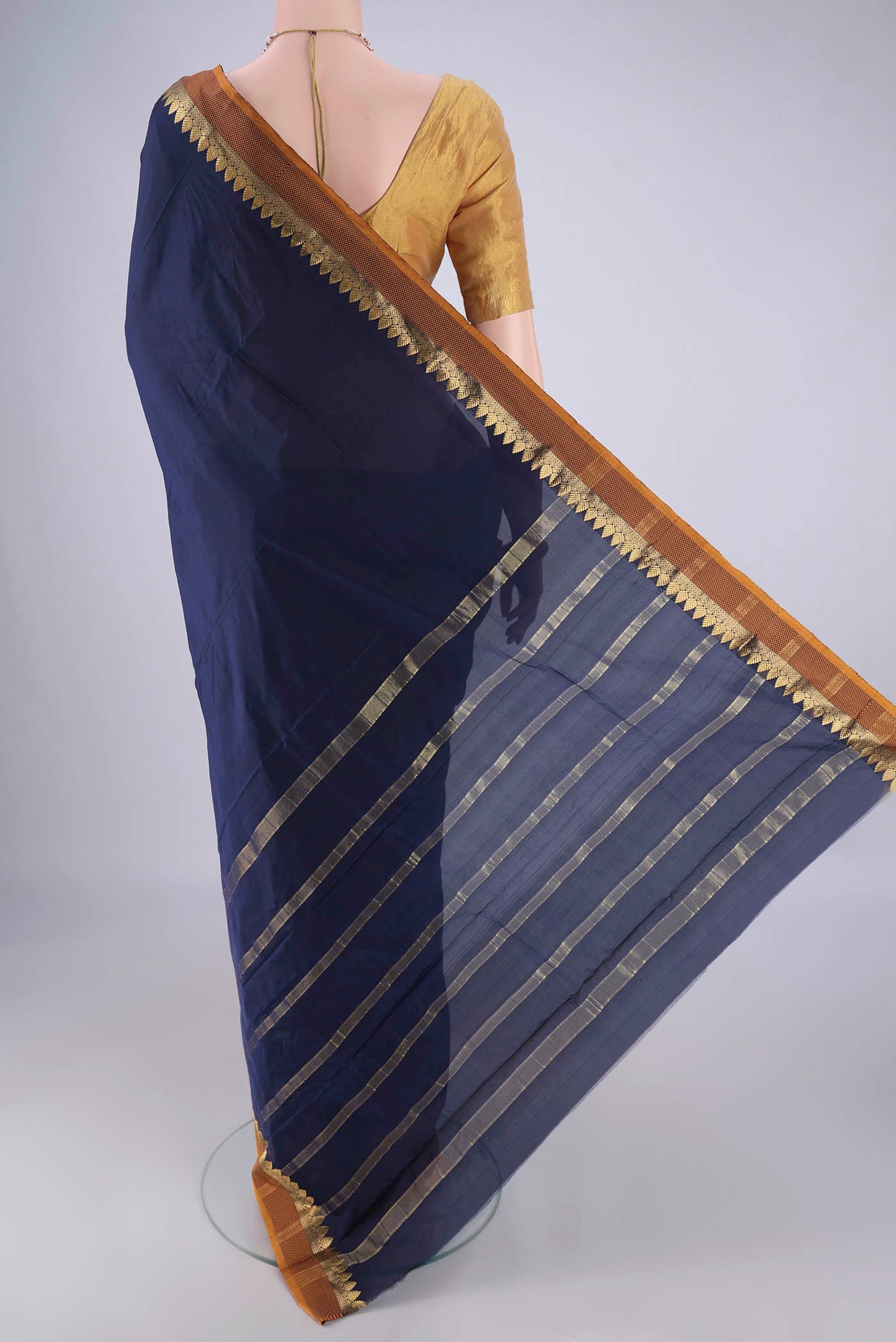 Flat view of Navy Blue Blended Bangalore Silk Saree with Plain Body and Plain Border. 