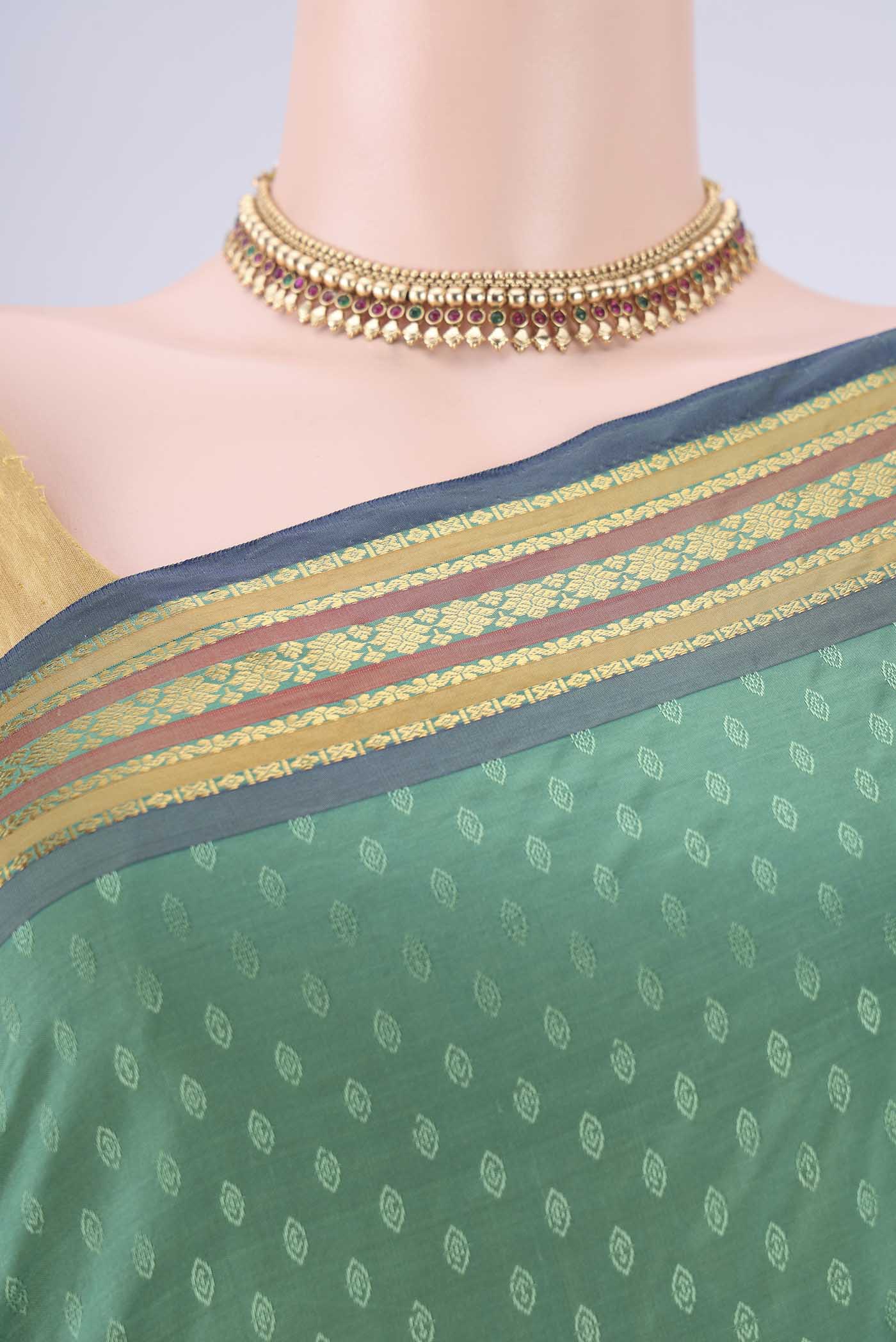 Border image of Light Green Blended Bangalore Silk Saree with Jacquard design on the body and Plain Border. 