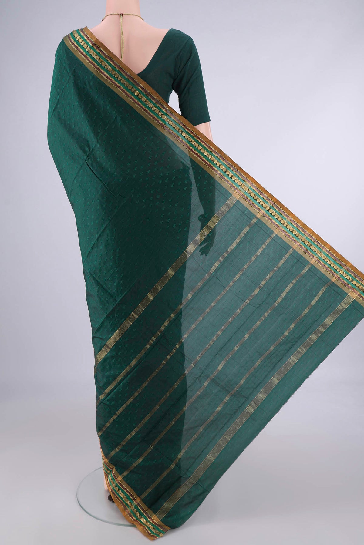 Flat view of Bottle Green Blended Bangalore Silk Saree with Jacquard design on the body and Zari Border. 
