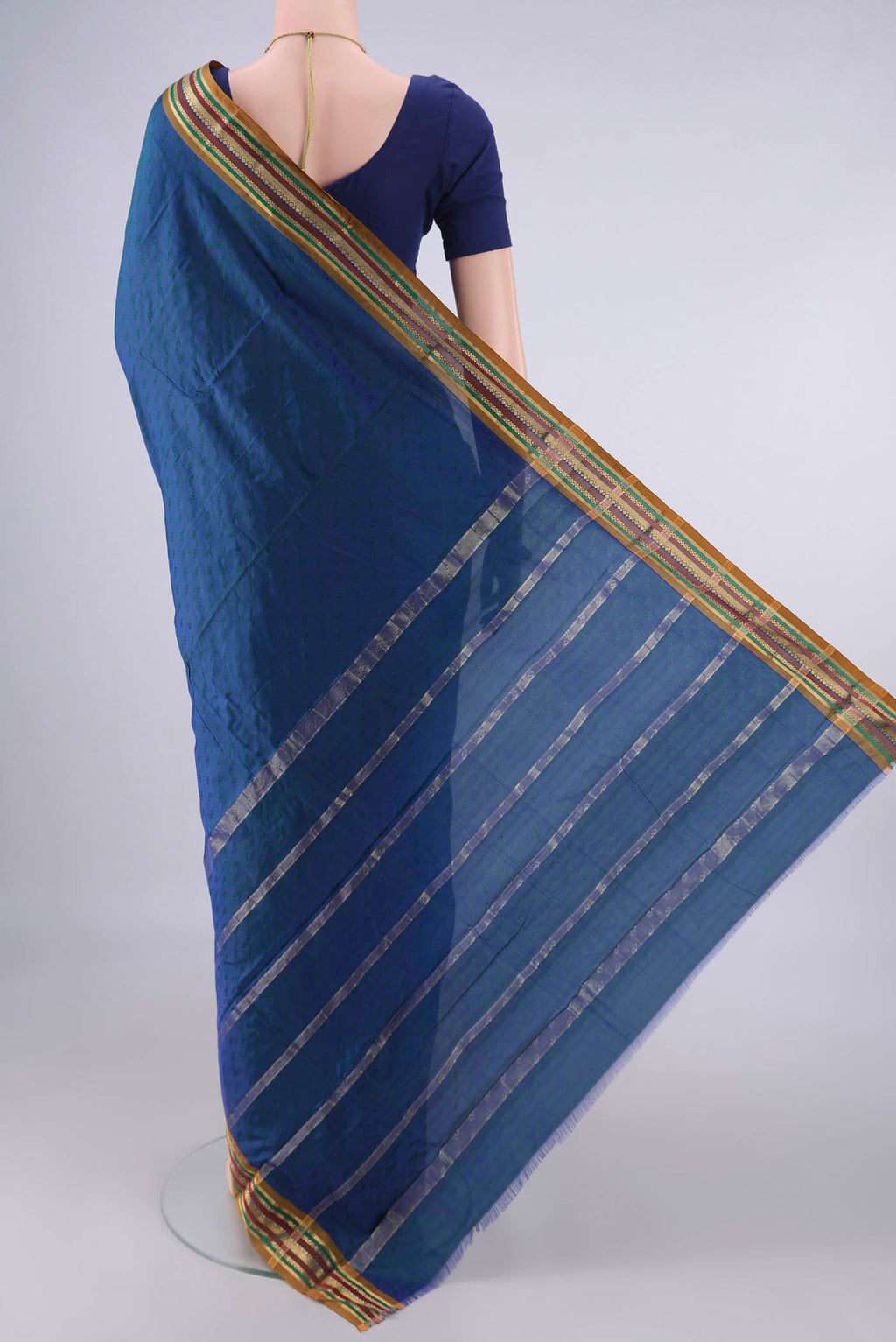 Flat view of Peacock Blue Blended Bangalore Silk Saree with Jacquard design on the body and Zari Border. 