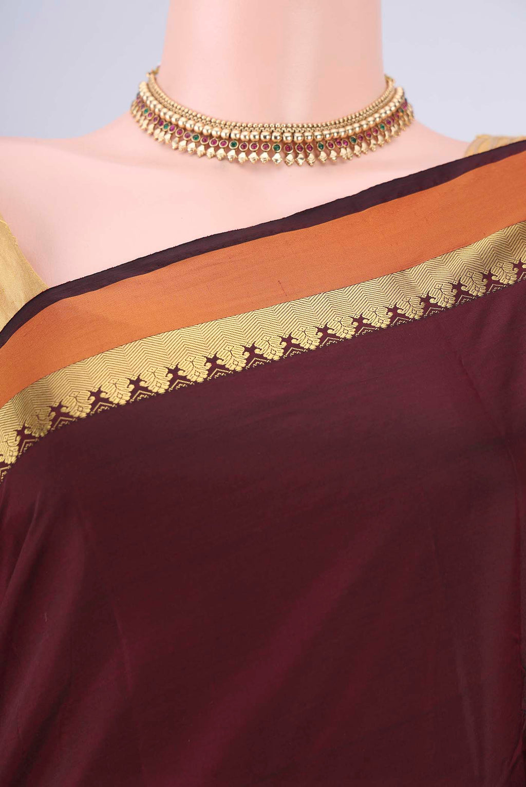 Border image of Maroon Blended Bangalore Silk Saree with Zari Butta on the body and Plain Border. 