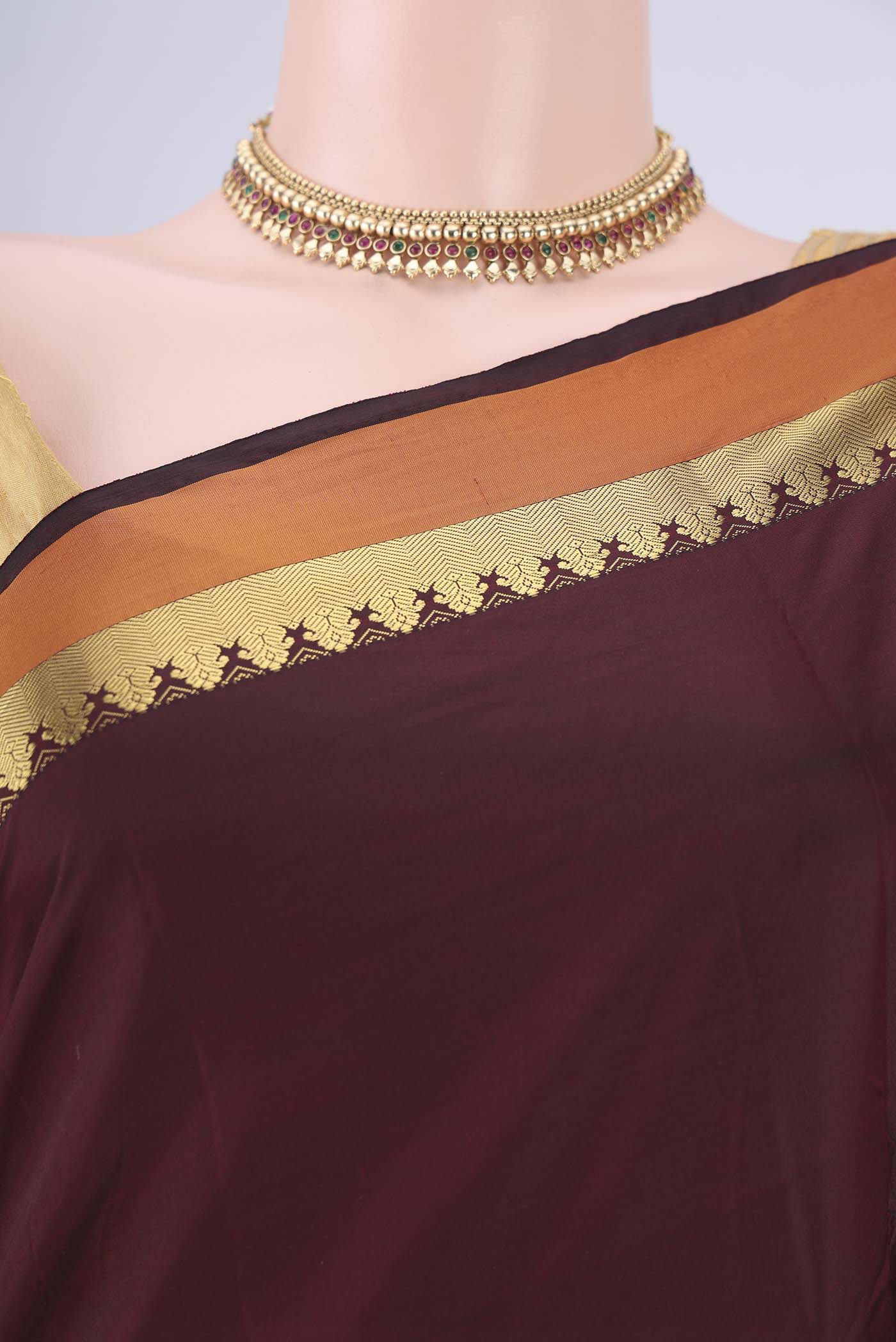 Border image of Maroon Blended Bangalore Silk Saree with Zari Butta on the body and Plain Border. 