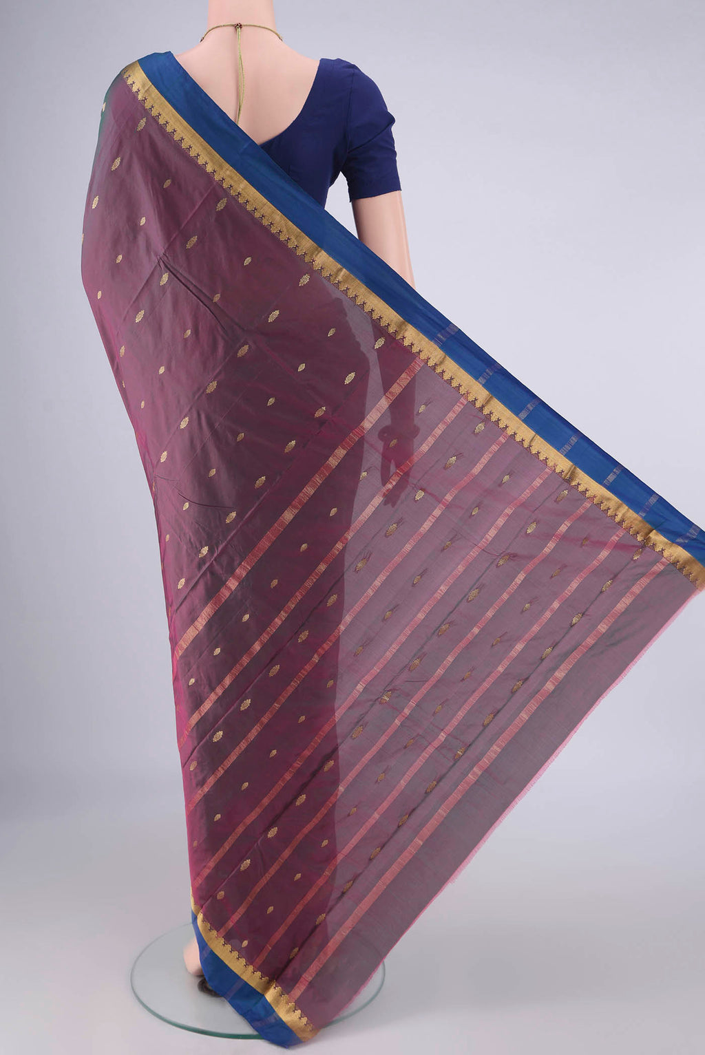 Flat view of Magenta with Green Color Blended Bangalore Silk Saree with Zari Butta on the body and Zari Border. 