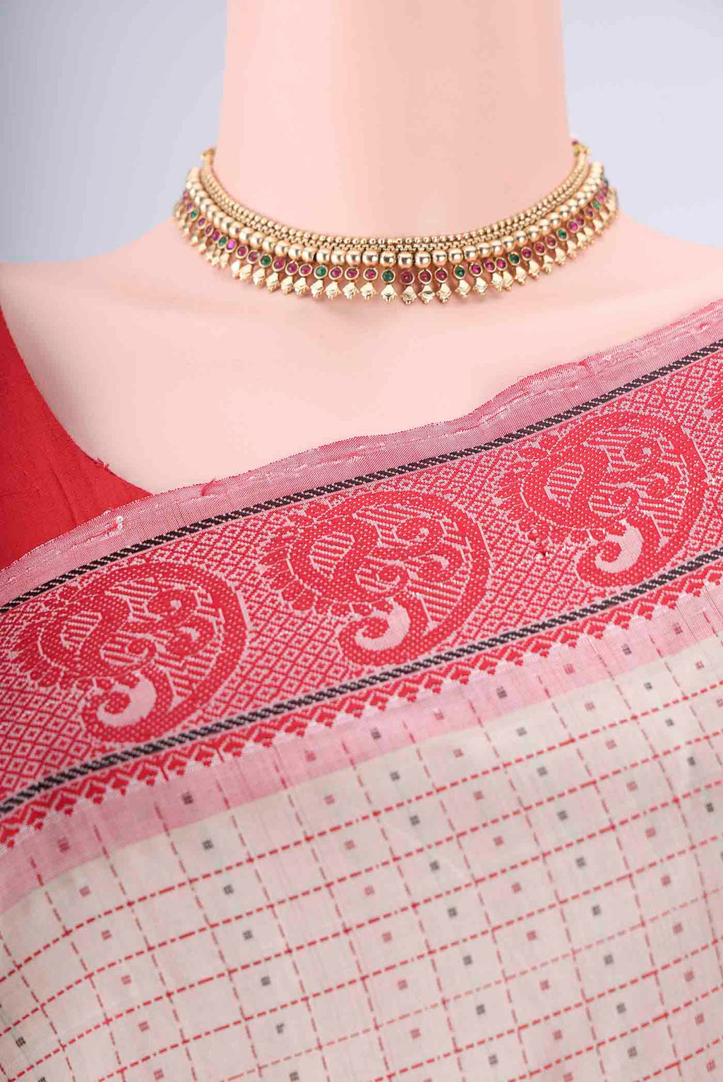 Border image of Beige Blended Poly Cotton Saree with Checked design on the body and Thread Border. 